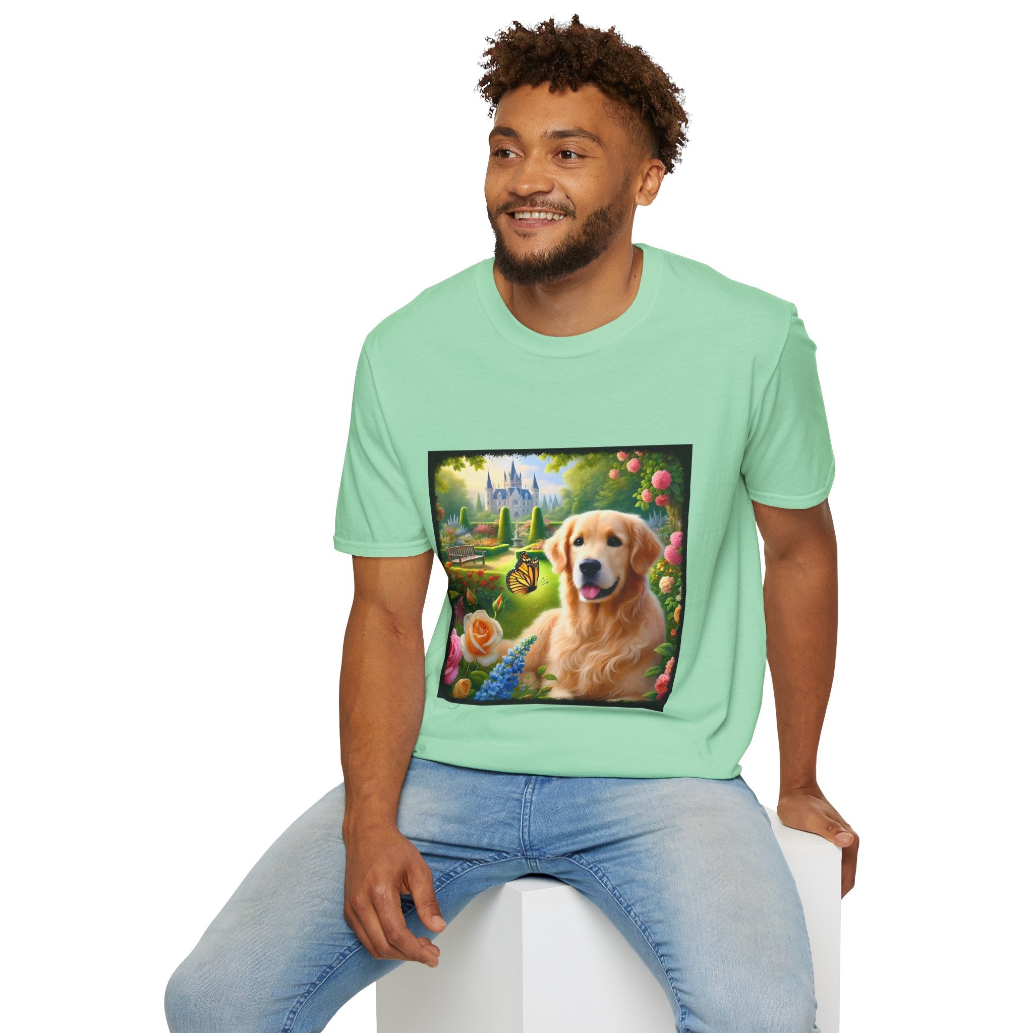 Male model wears mint green dog t-shirt featuring a golden retriever in a vibrant castle garden with blooming roses and a butterfly.
