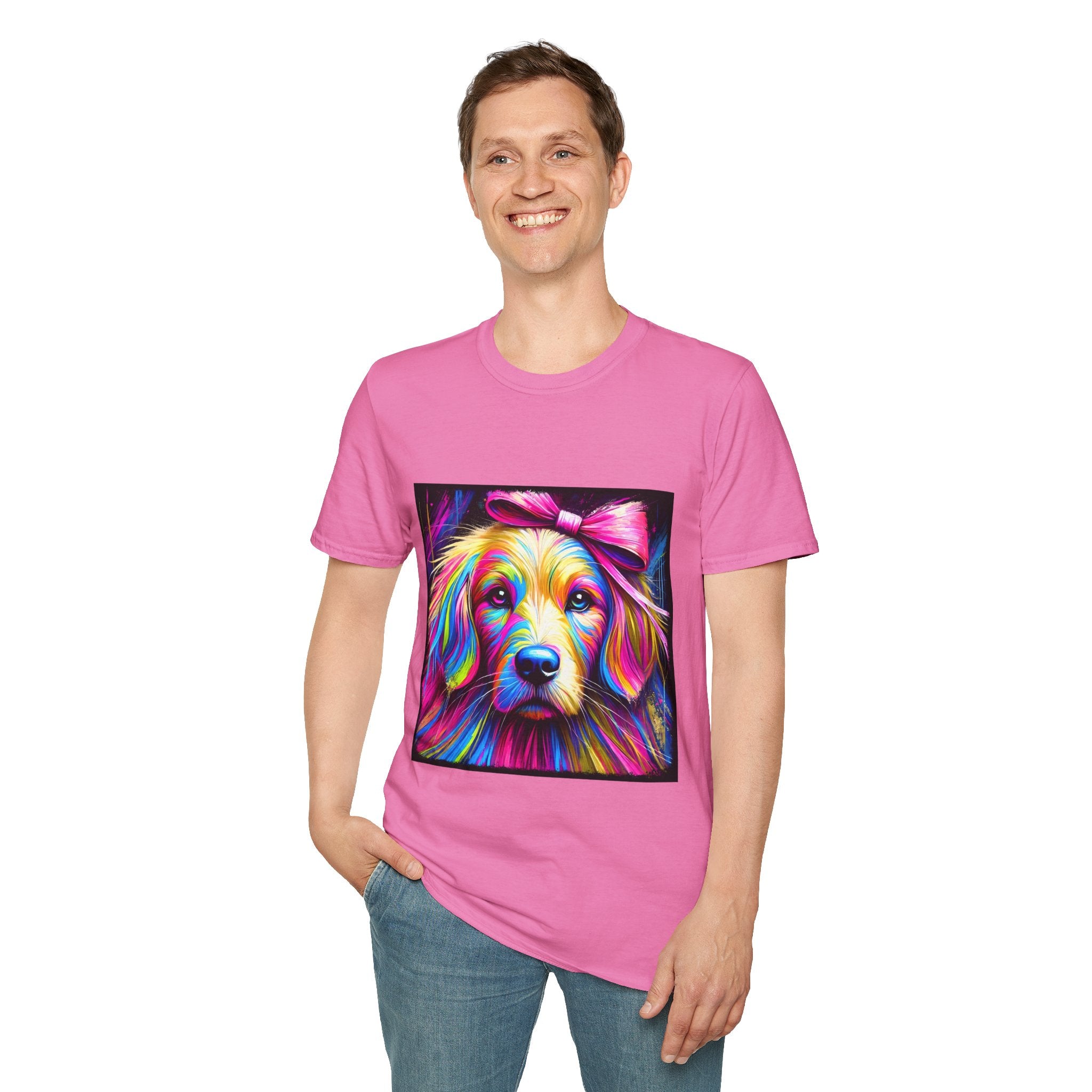 Male model in pink dog t-shirt featuring neon-colored golden retriever with pink bow on vibrant electric abstract backdrop.