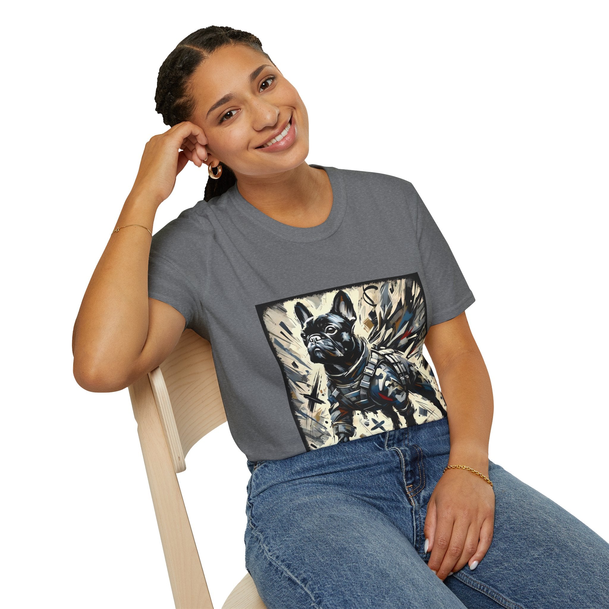Woman smiling in graphite heather dog t-shirt featuring heroic black French Bulldog in battle armor, set against abstract explosive strokes.