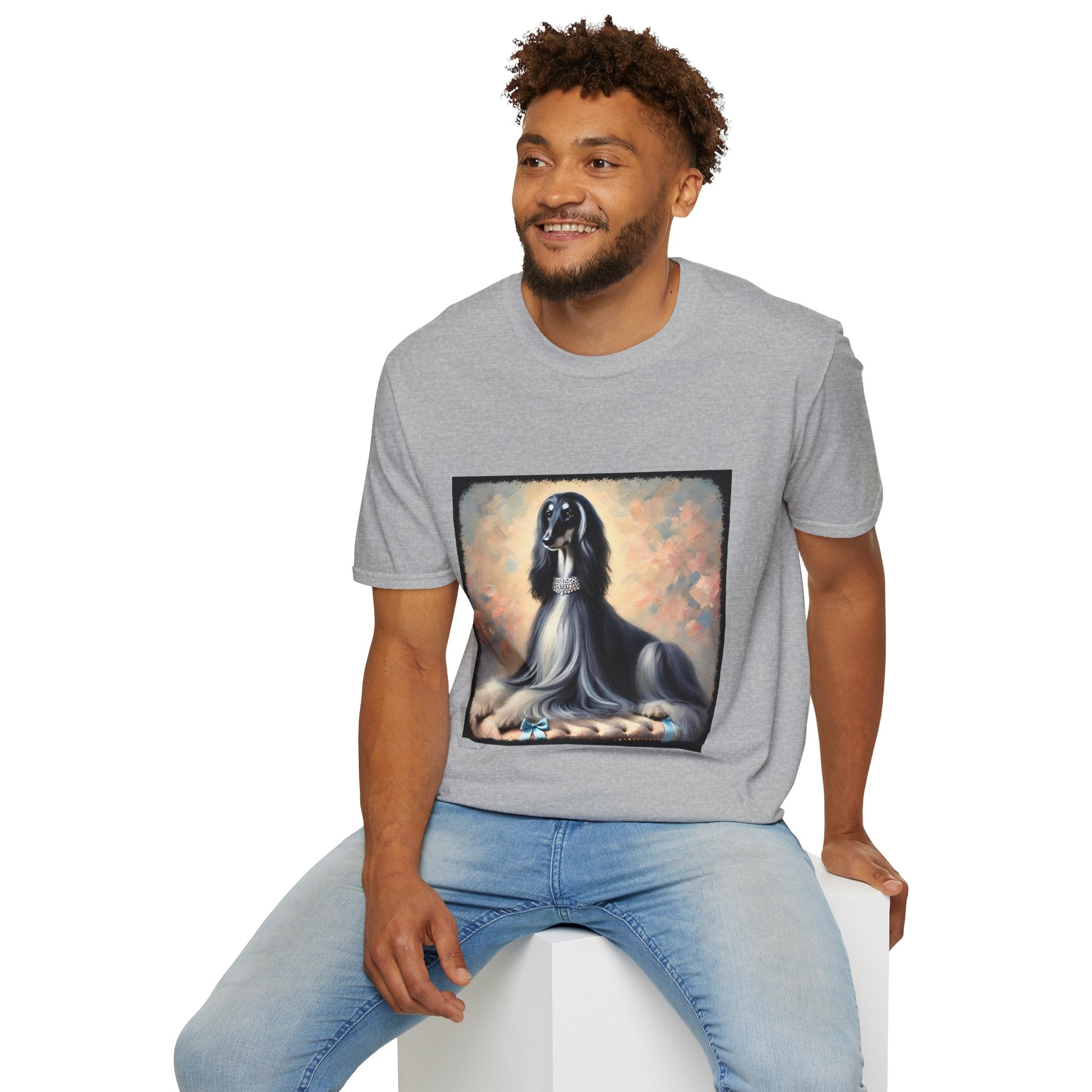 Front view of person wearing ice gray dog t-shirt featuring black and white Afghan Hound on cushion with diamond necklace, pastel background