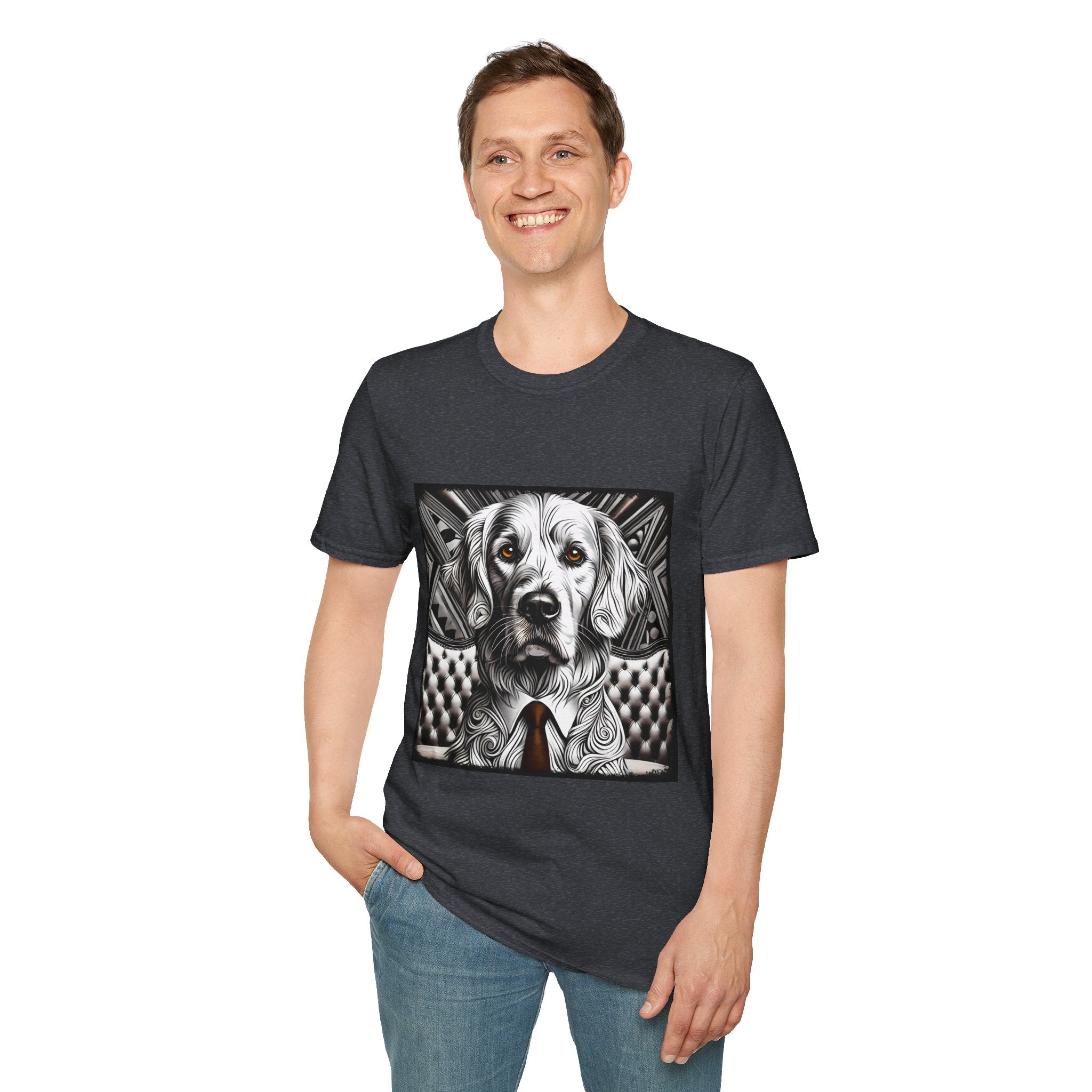 Male model in dark heather dog t-shirt featuring monochrome golden retriever with brown eyes and tie in front of settee.