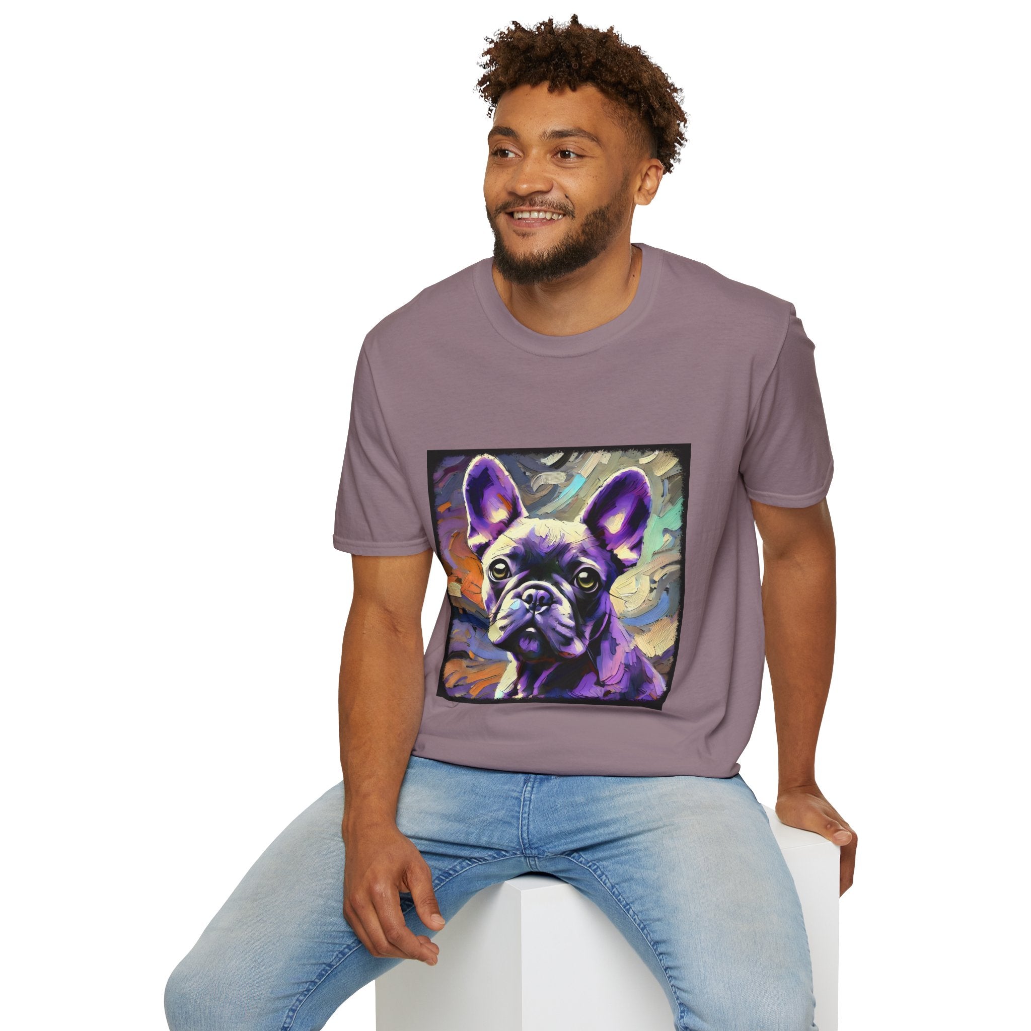 Male model in mauve dog t-shirt featuring a lavender purple French Bulldog with swirling brushstrokes of teal, orange, and cream.