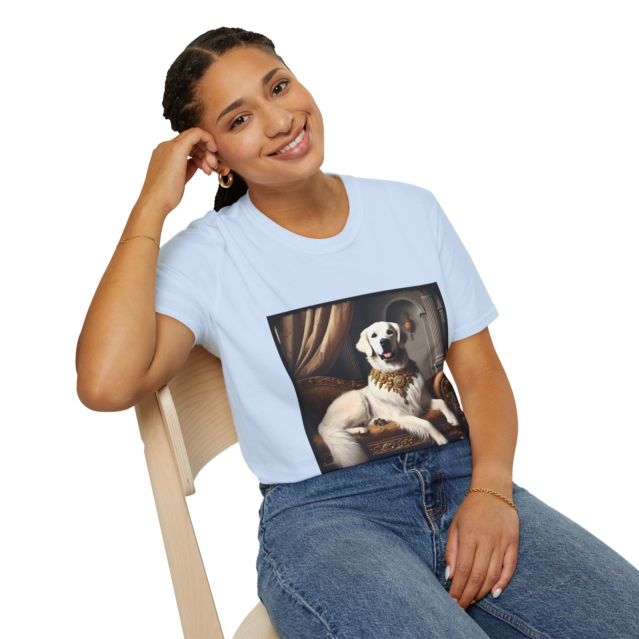 Female model wears light blue dog t-shirt featuring a regal white golden retriever lounging on a gold settee with ornate curtains.