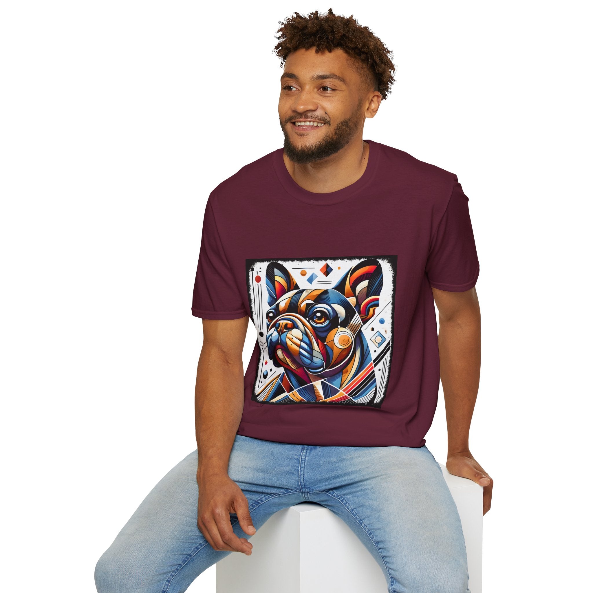 Male model in maroon dog t-shirt featuring geometric-style French Bulldog in vivid orange, blue, and red against a white abstract background.