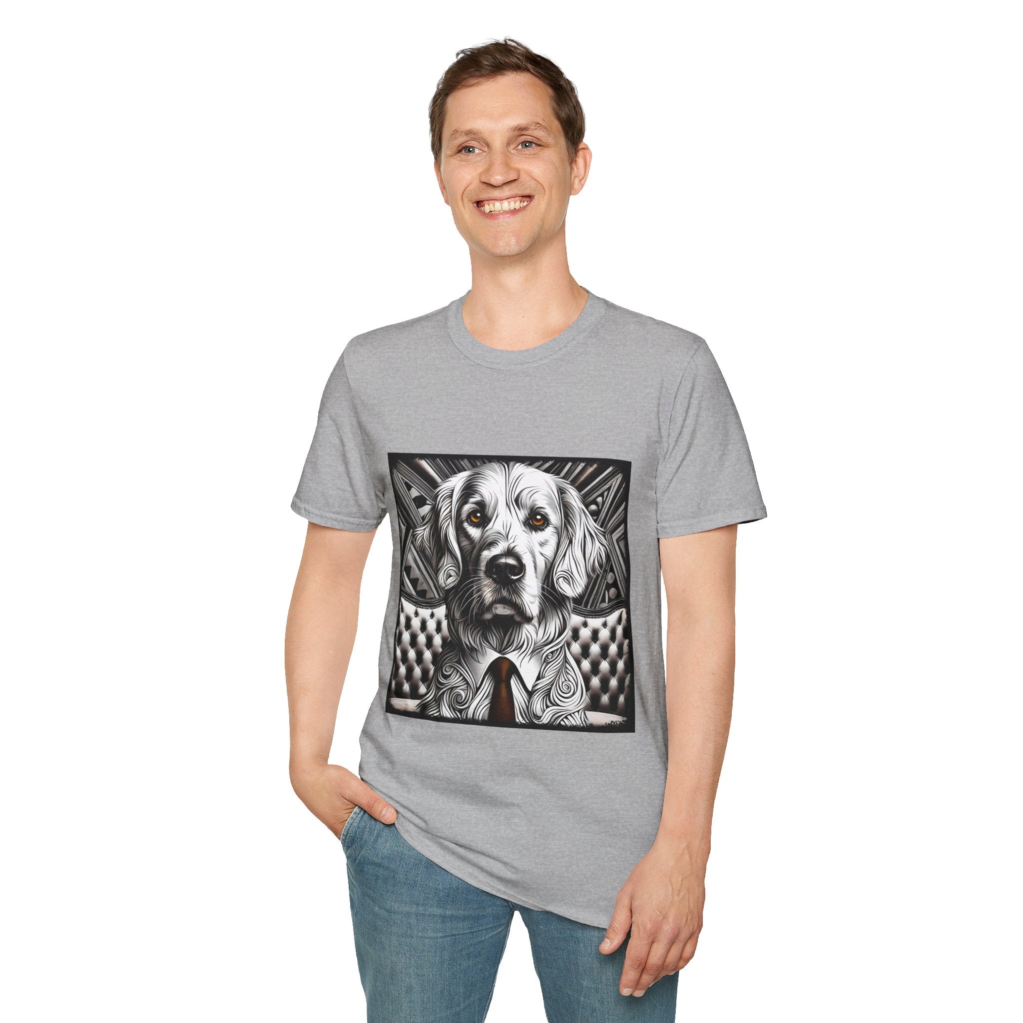 Male model in sport gray dog t-shirt featuring monochrome golden retriever with brown eyes and tie in front of settee.