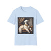 Light blue dog t-shirt featuring a regal white golden retriever lounging on a gold settee with ornate curtains.