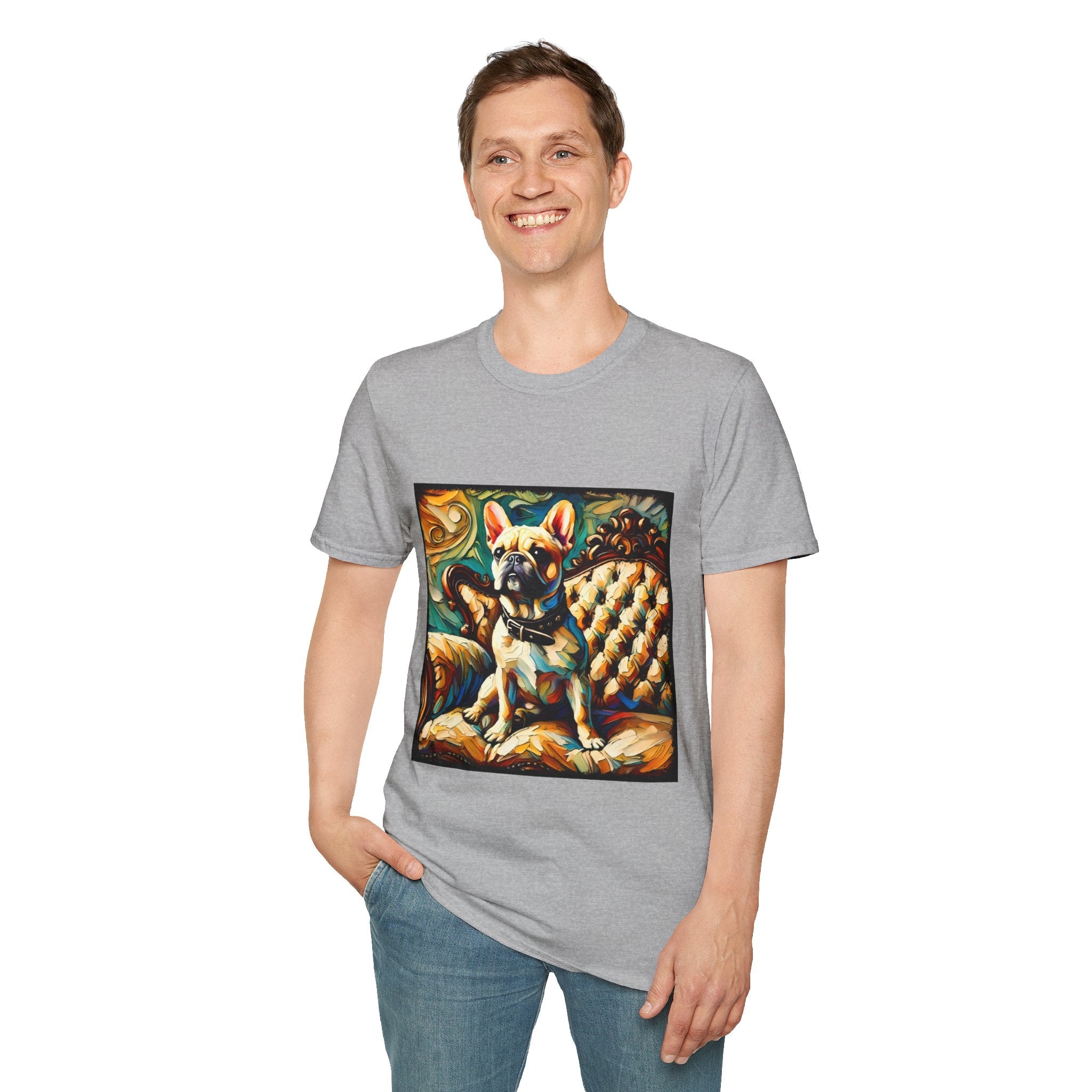 Male model in sport gray dog t-shirt featuring fawn French Bulldog with collar on golden tufted settee and bold swirl backdrop.
