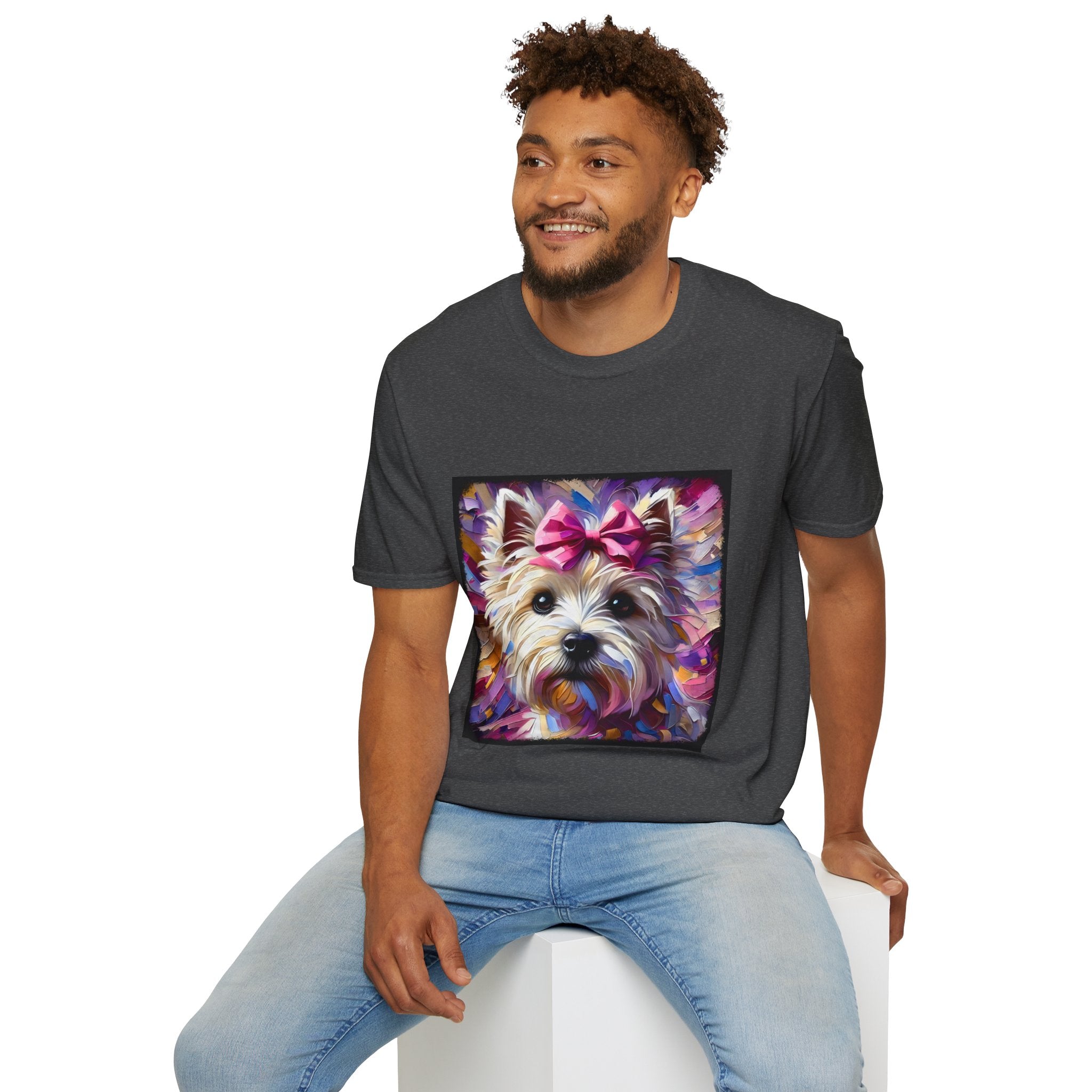 Male model in dark heather dog t-shirt with Westie face, pink bow, and bold brushstroke colors in purple, pink, and gold.