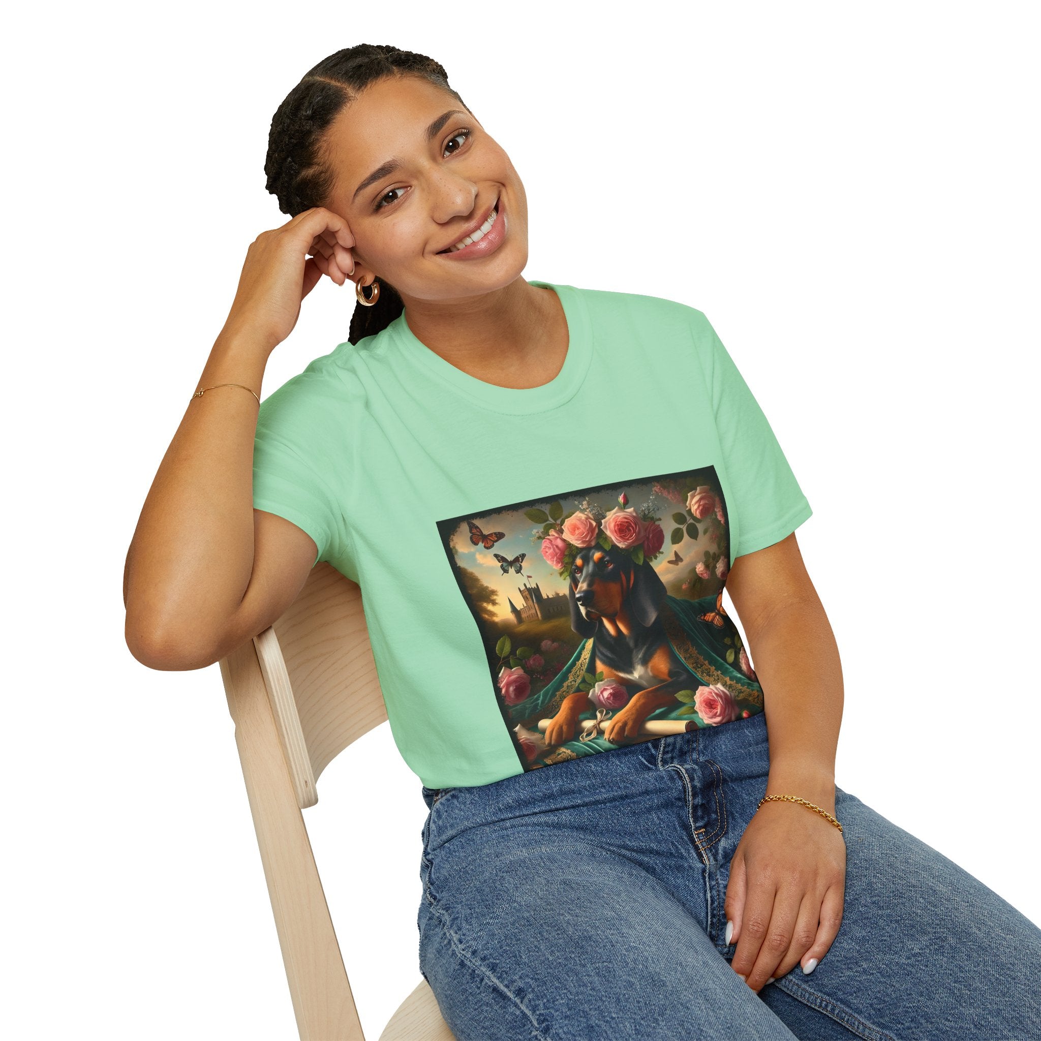 Female model in mint green dog t-shirt featuring coonhound in rose garden wearing green embroidered cape and crown of pink flowers.