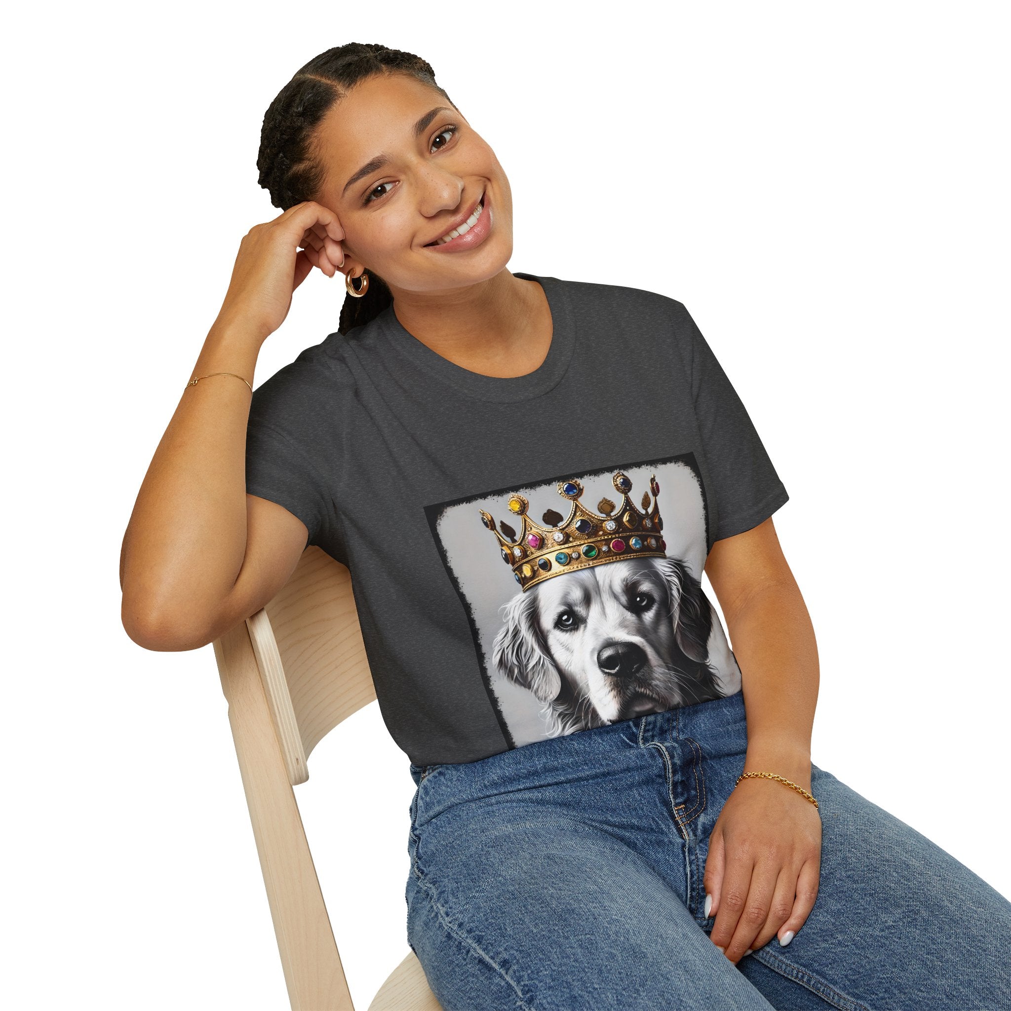 Female model in dark heather dog t-shirt featuring a black-and-white golden retriever in jeweled crown on gray backdrop.