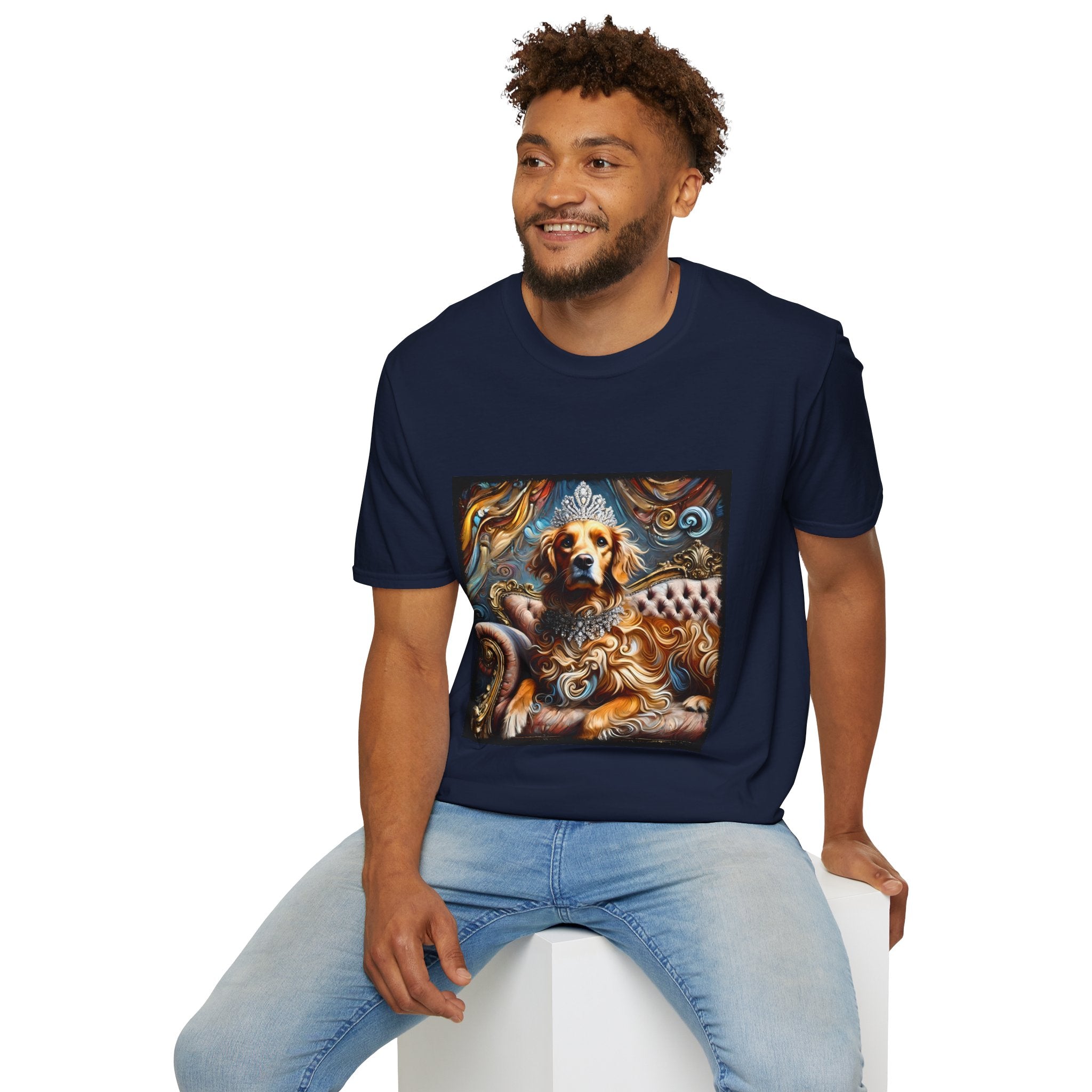 Male model in navy dog t-shirt with golden retriever in crown and jewels on tufted settee, baroque-style backdrop.
