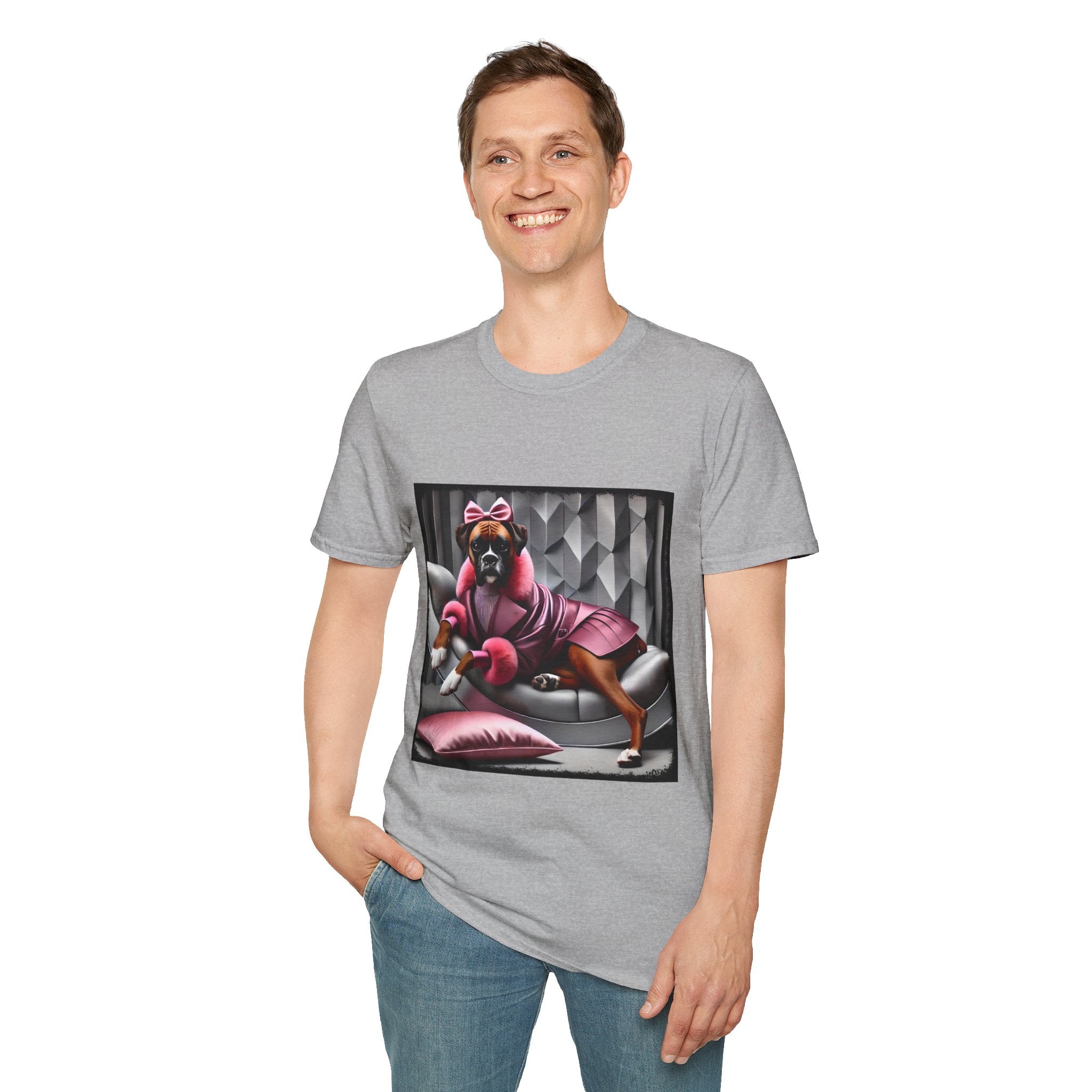 Male model in sport gray dog t-shirt featuring boxer in pink bow and pleated pink coat lounging on silver settee.