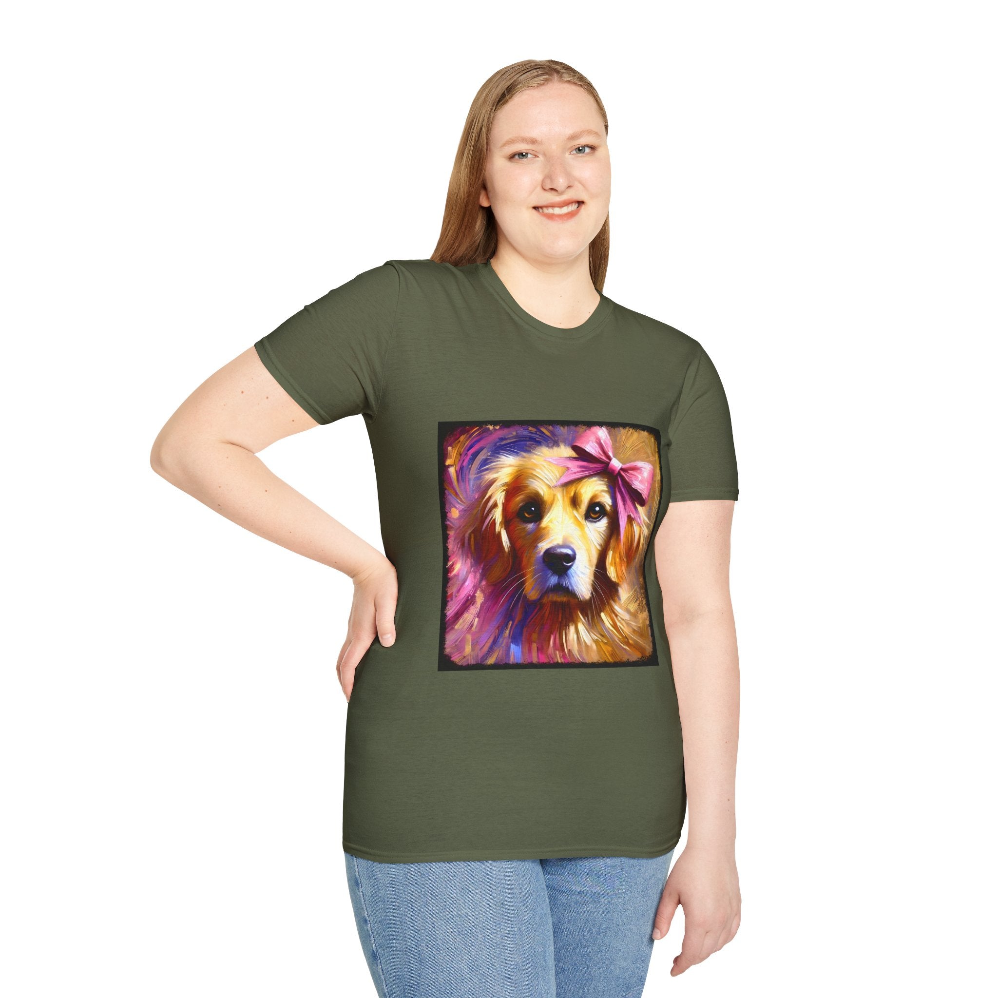 Female model in military green dog t-shirt featuring golden retriever with pink bow on head, bold brushstroke background in pinks.