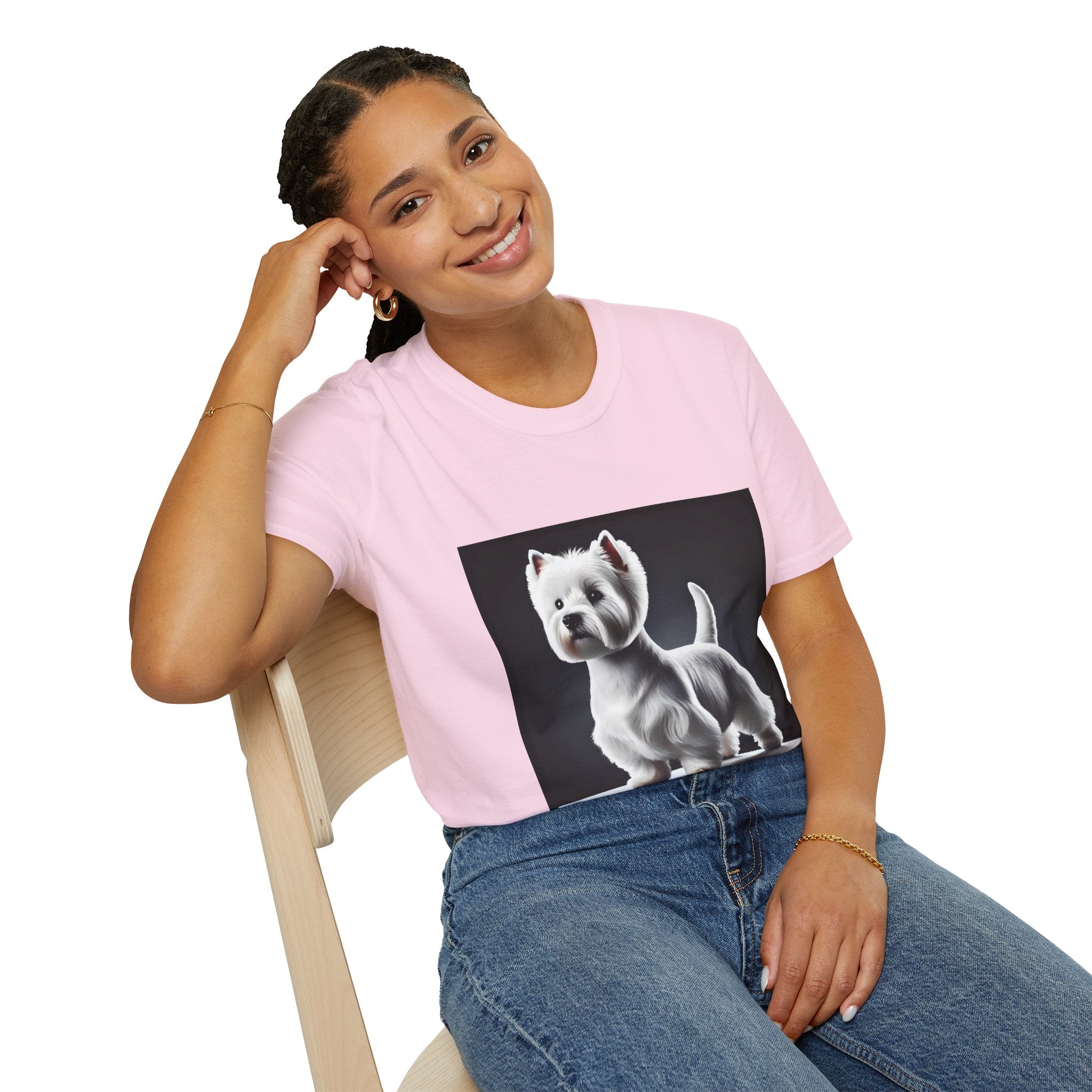 Female model in light pink dog t-shirt featuring a Westie standing proud on a platform against a dramatic dark backdrop.