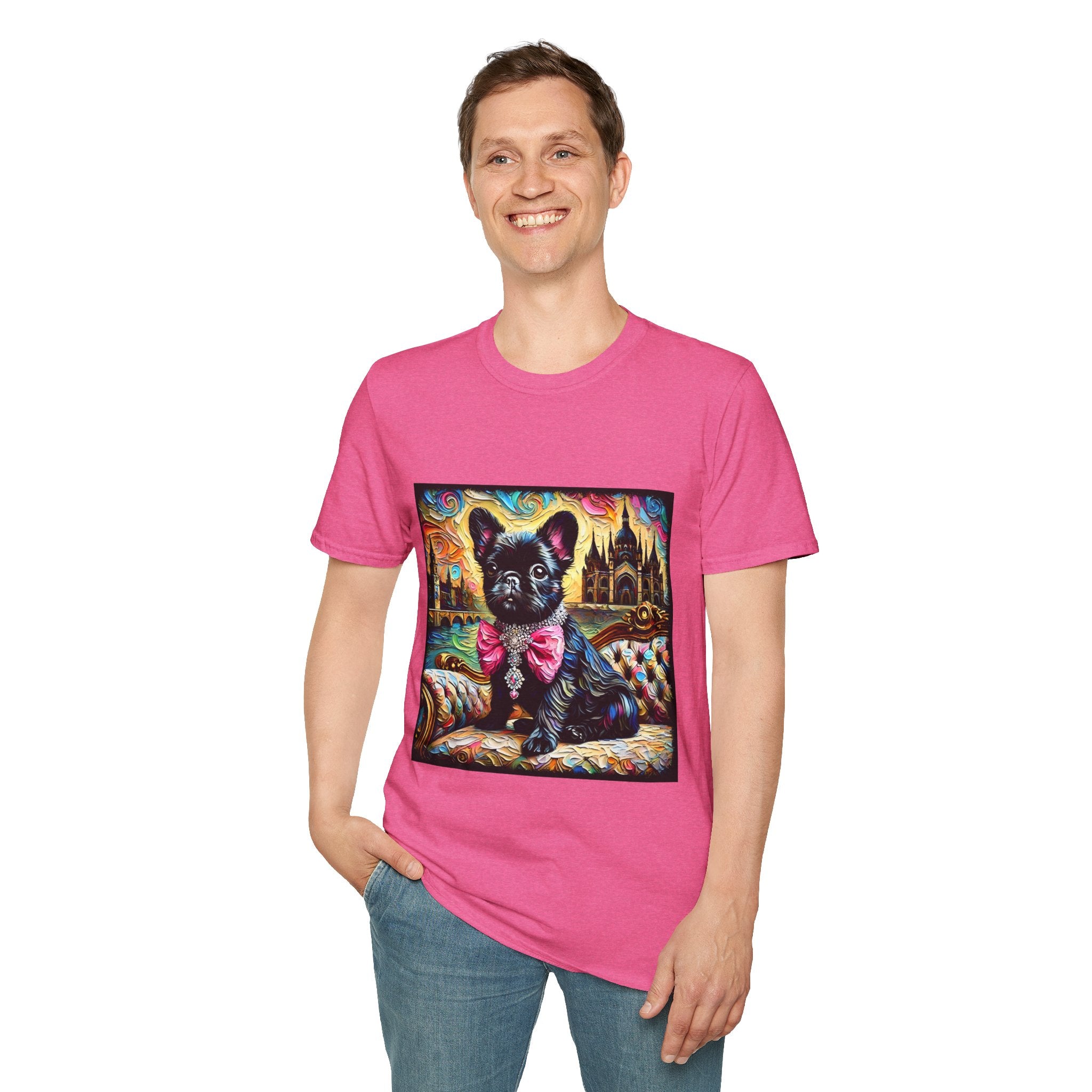 Man smiling wearing bright pink dog t-shirt featuring black French Bulldog in jeweled pink bow on settee with vivid castle background.