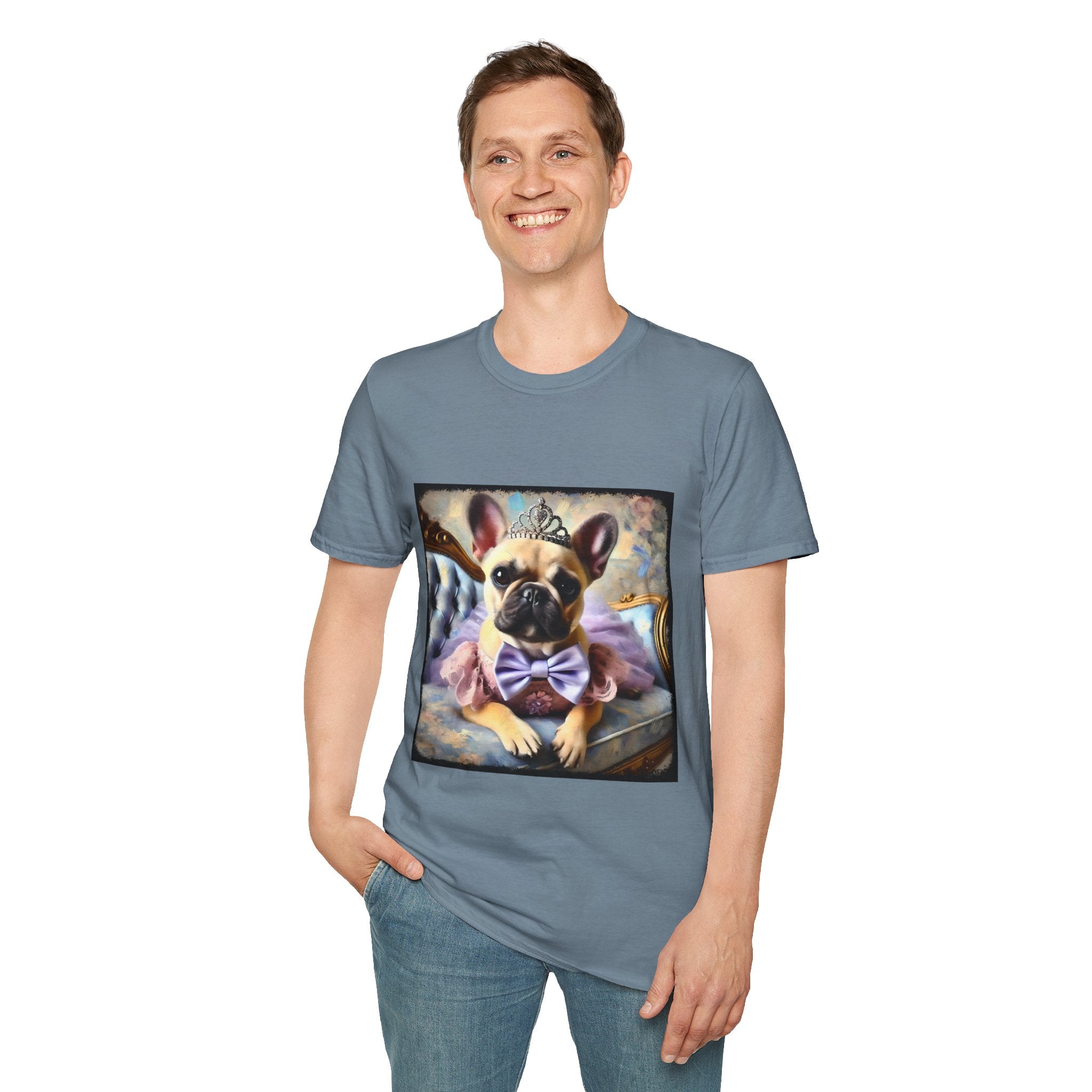 Man smiling in slate blue dog t-shirt featuring French Bulldog in tiara and tutu on royal chair with dreamy pastel background.