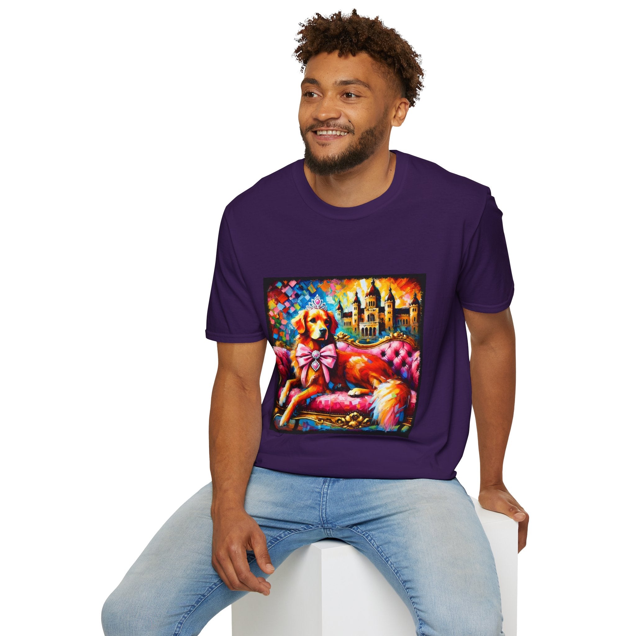 Male model in purple dog t-shirt featuring golden retriever princess on pink settee with tiara and castle backdrop.