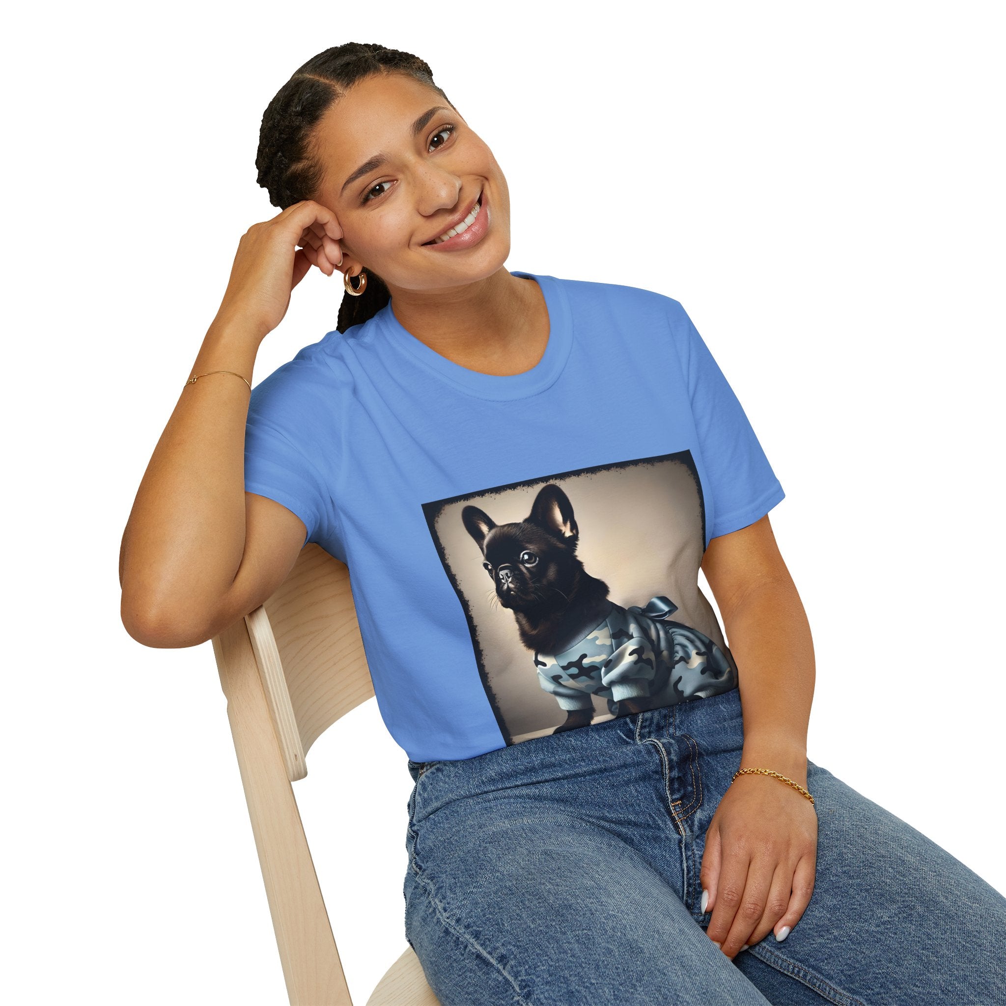 Woman sitting wearing carolina blue dog t-shirt featuring black French Bulldog in blue camo outfit with bow, set in soft vintage portrait.