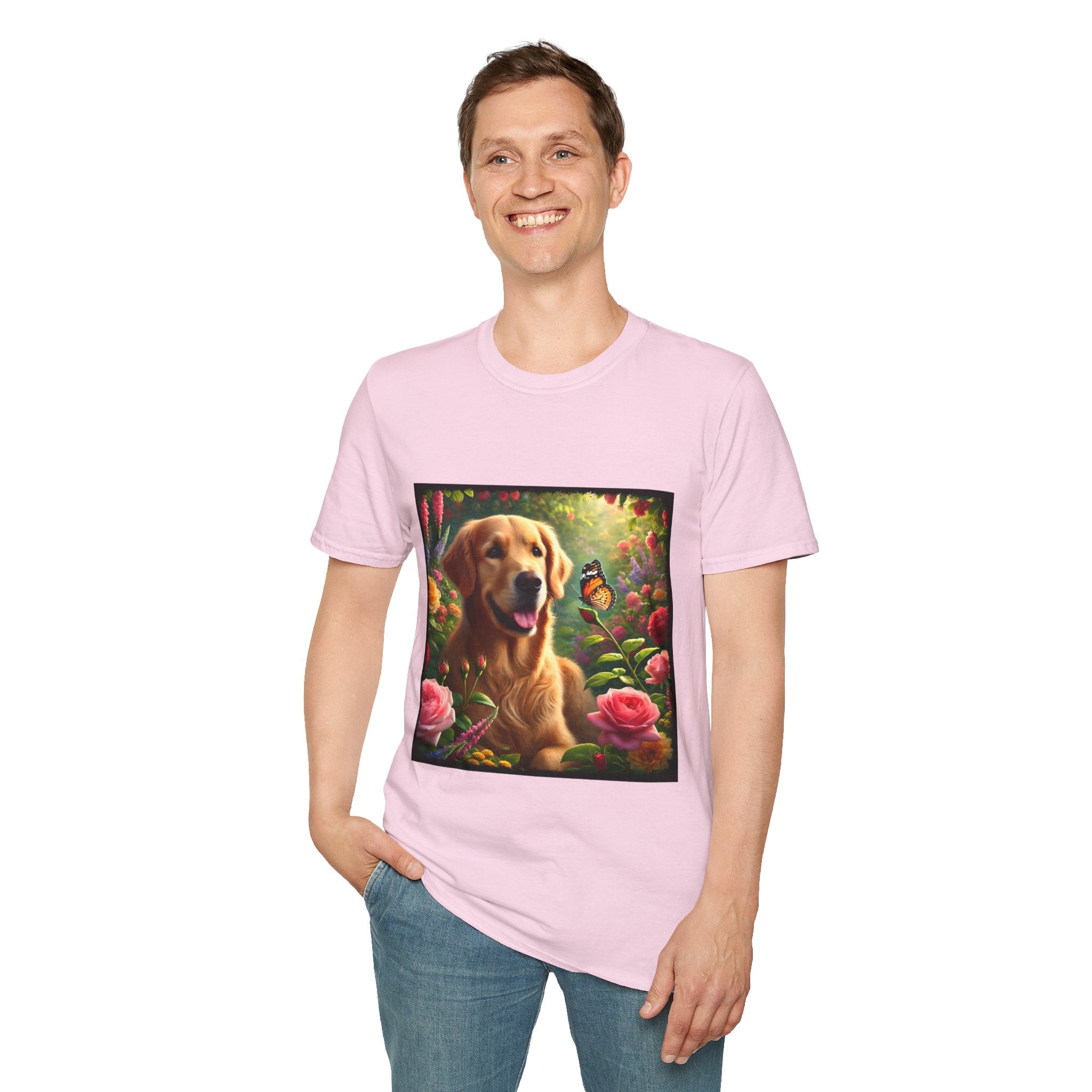 Male model wears light pink dog t-shirt featuring a golden retriever in a vibrant garden with roses, wildflowers, and a butterfly.