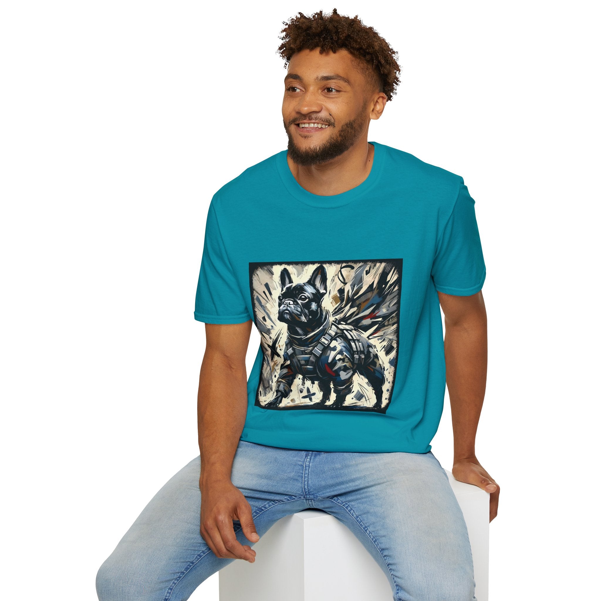 Male model in jade dome dog t-shirt featuring heroic black French Bulldog in battle armor, set against abstract explosive strokes.