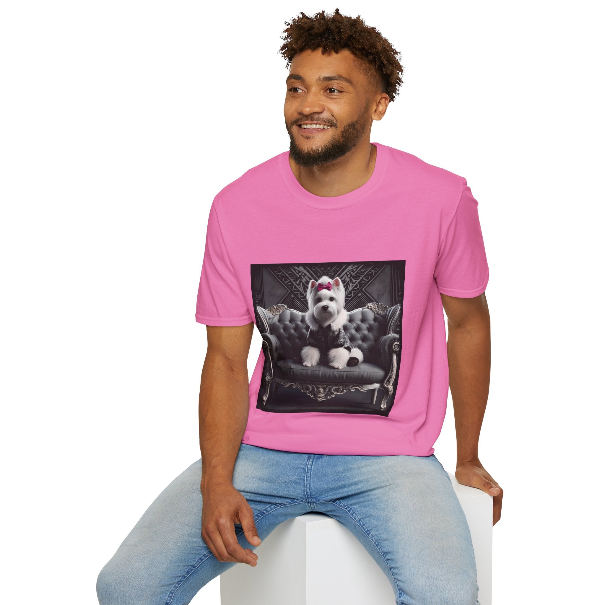 Male model in pink dog t-shirt featuring Westie in black outfit with pink bow seated on ornate gothic black couch.