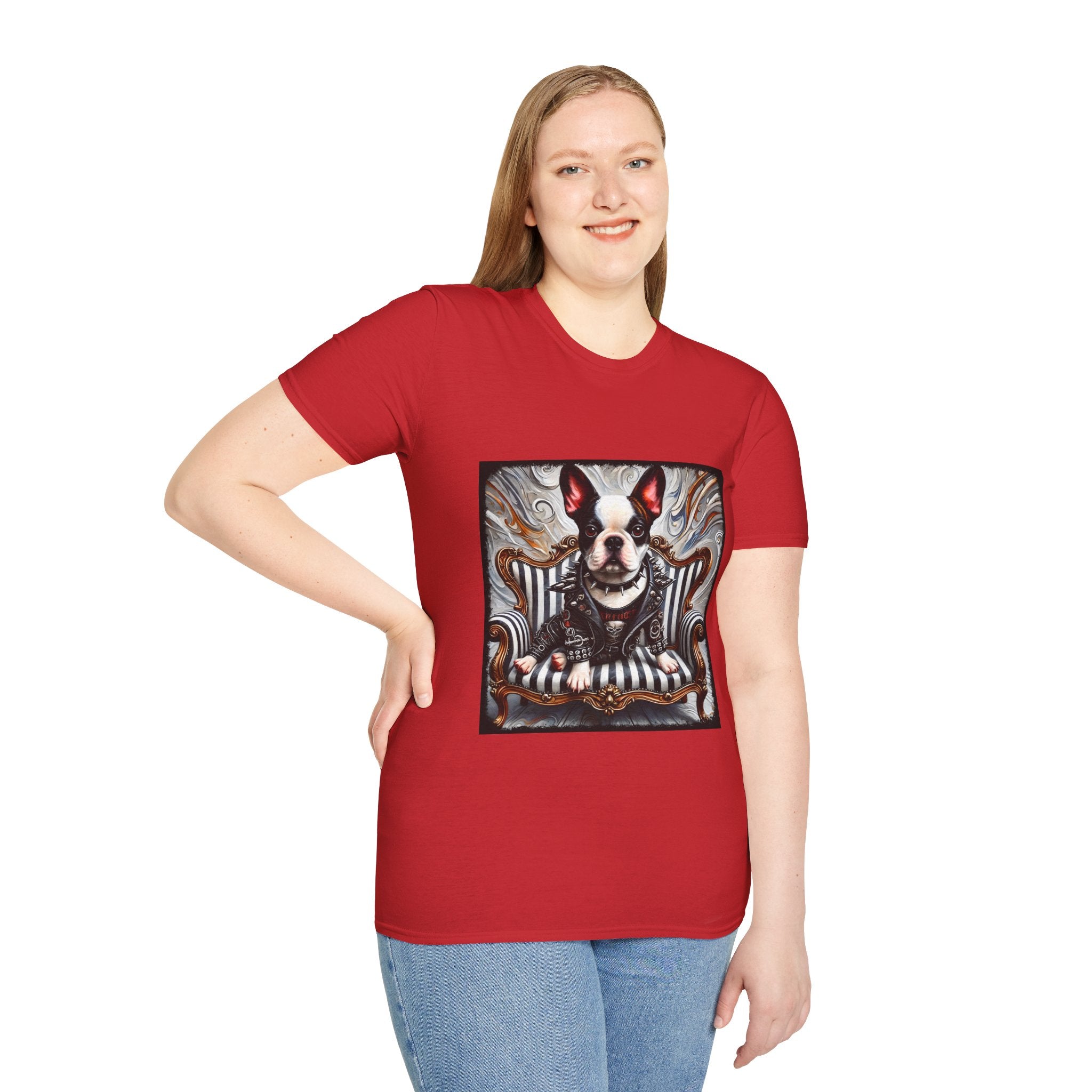 Female model in red dog t-shirt featuring Boston Terrier in leather studded jacket on striped chair with metallic swirl background.