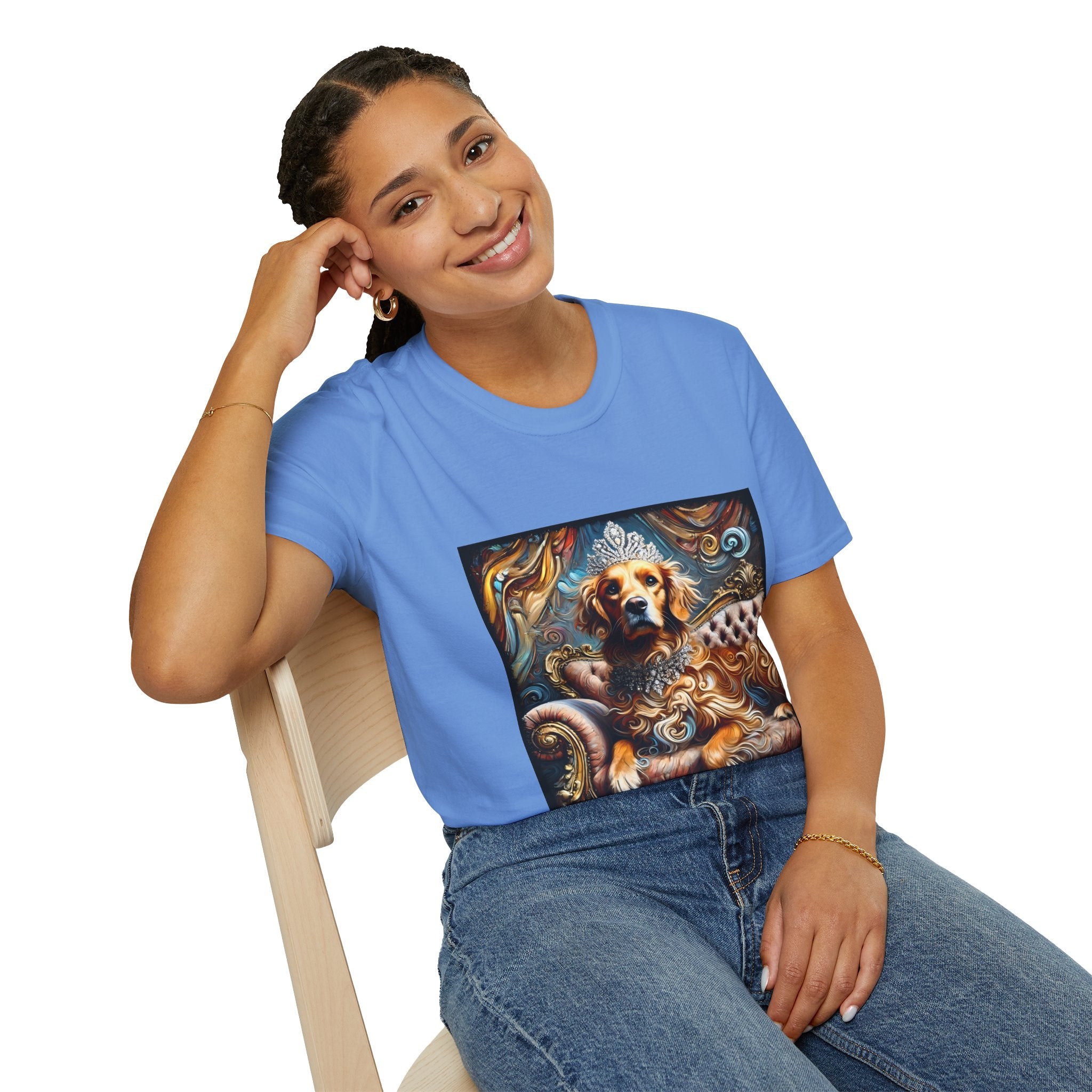 Female model in Carolina blue dog t-shirt with golden retriever in crown and jewels on tufted settee, baroque-style backdrop.
