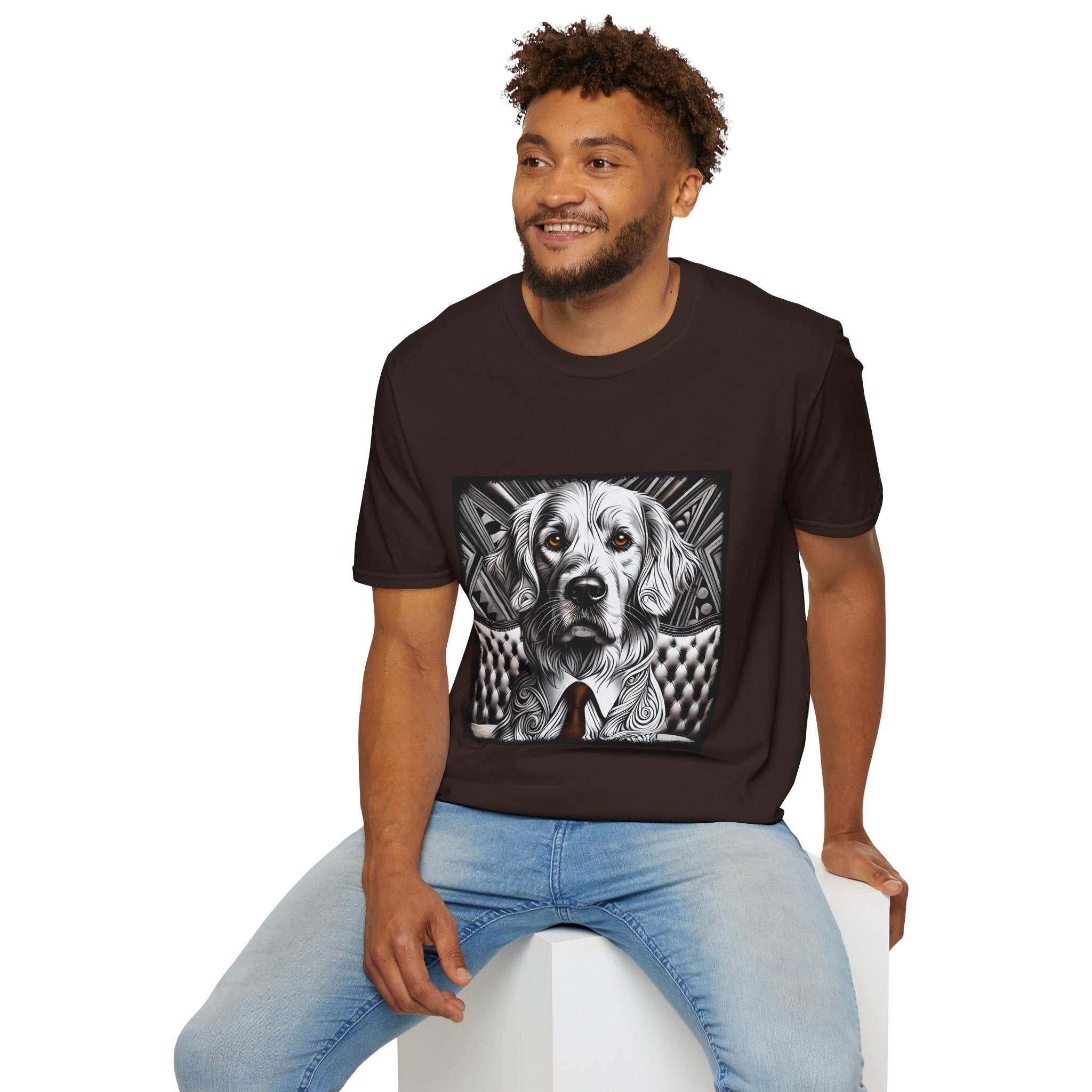 Male model in dark chocolate dog t-shirt featuring monochrome golden retriever with brown eyes and tie in front of settee.