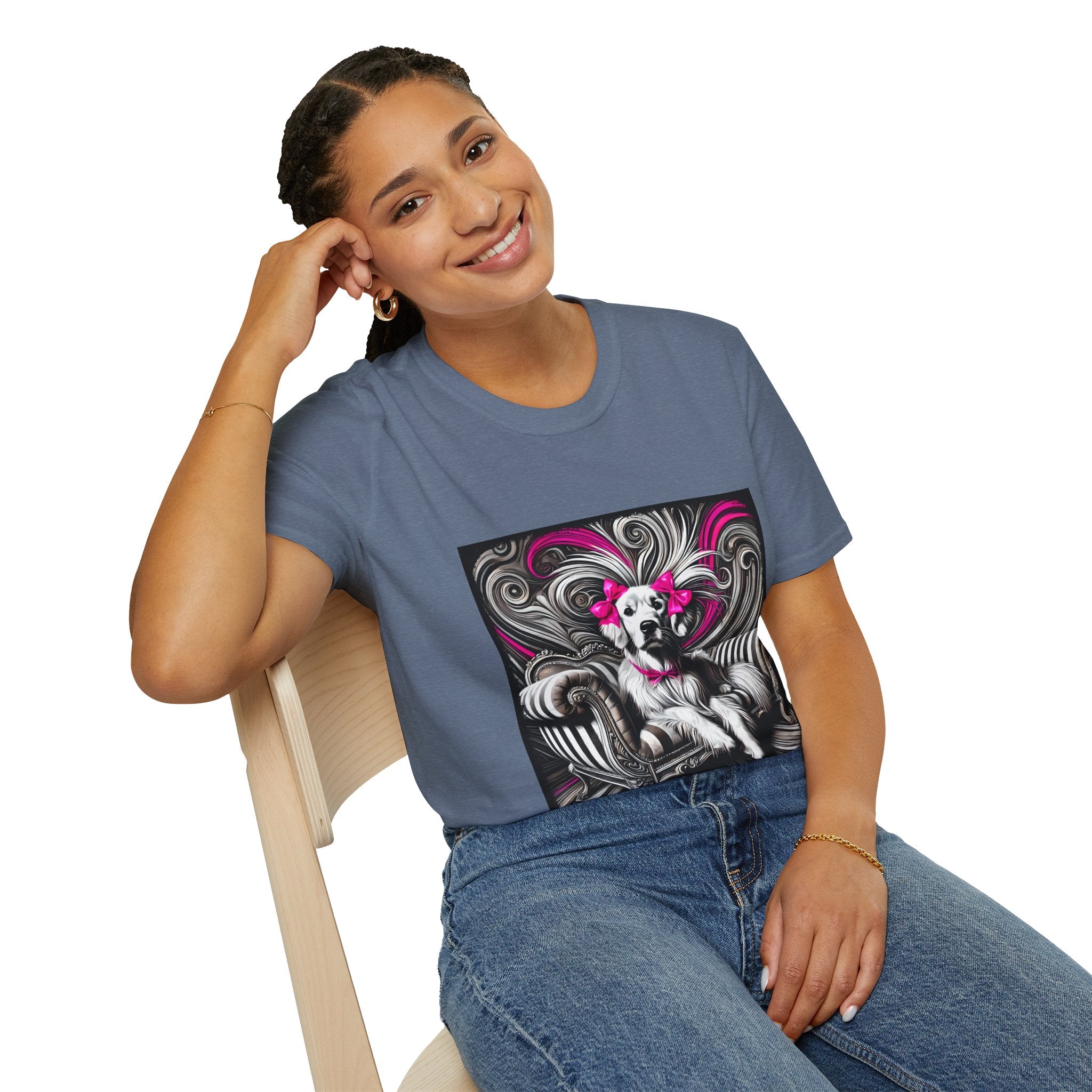 Female sitting in heather indigo dog t-shirt featuring black-and-white art of retriever with pink bows and swirling accents.