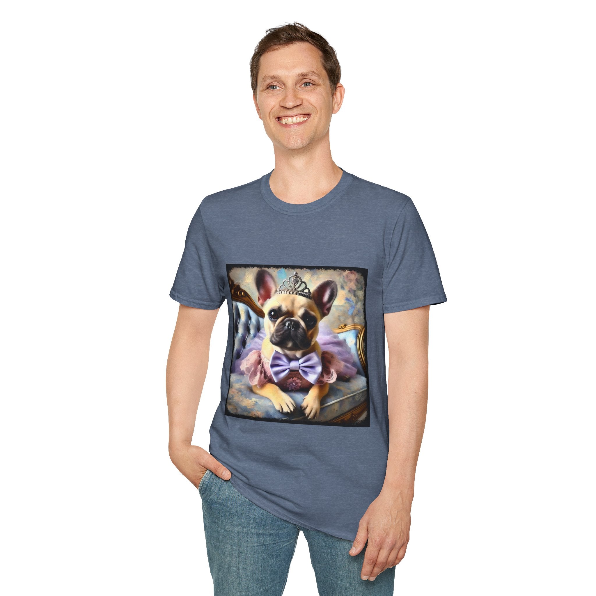 Man smiling in denim blue dog t-shirt featuring French Bulldog in tiara and tutu on royal chair with dreamy pastel background.