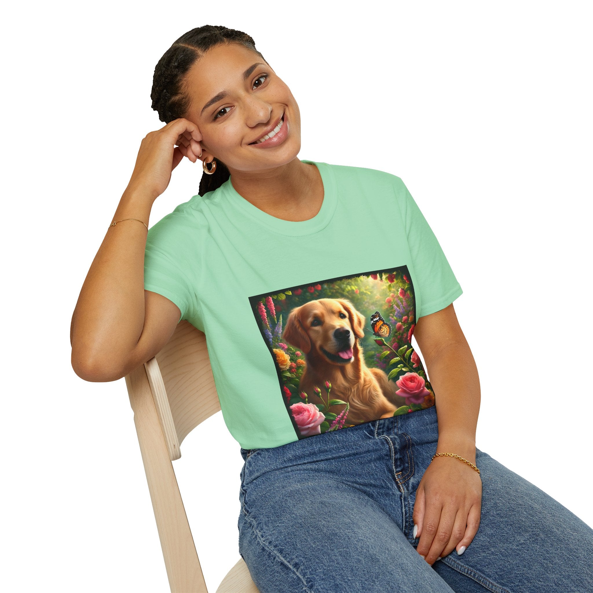 Female model wears mint green dog t-shirt featuring a golden retriever in a vibrant garden with roses, wildflowers, and a butterfly.
