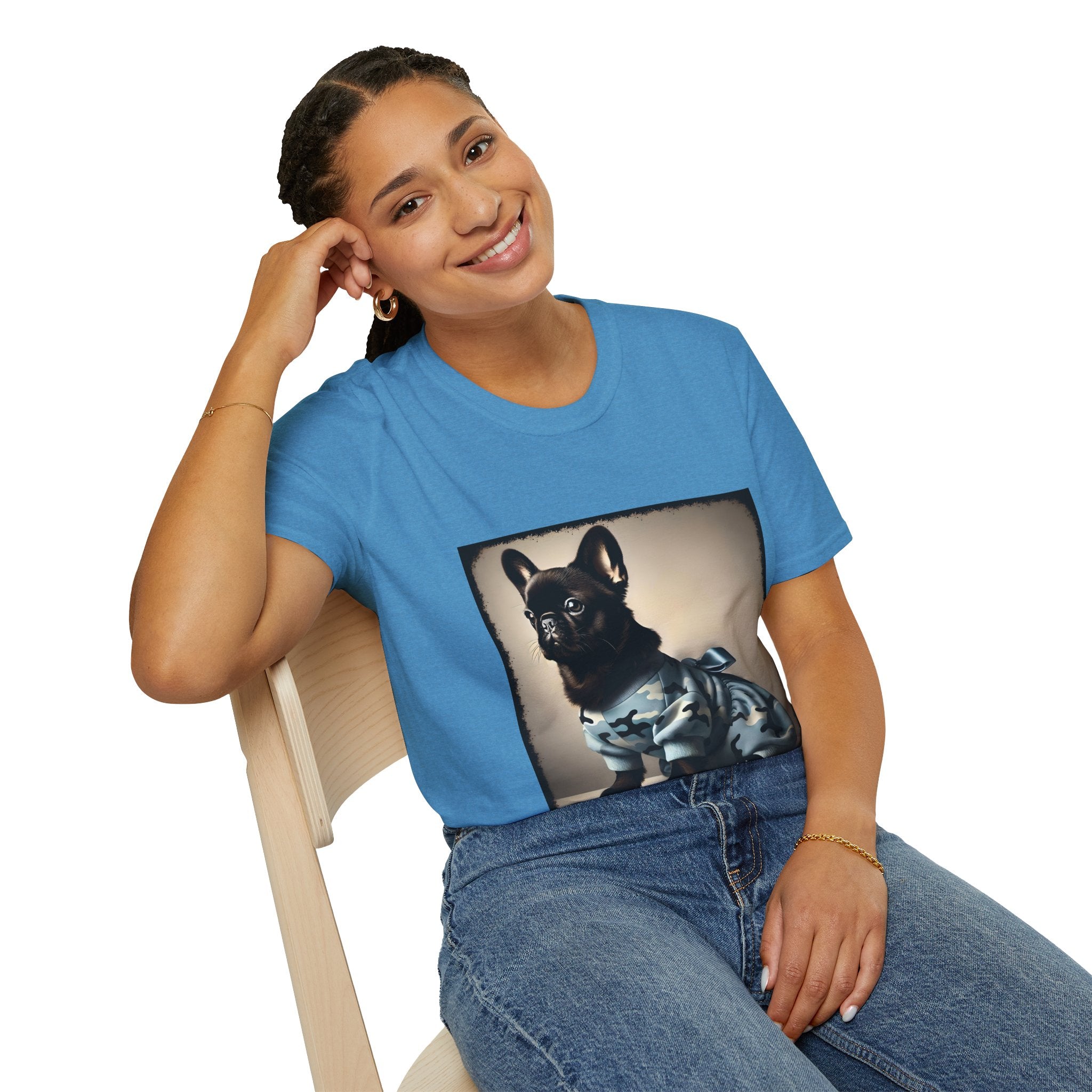 Woman sitting wearing sapphire blue dog t-shirt featuring black French Bulldog in blue camo outfit with bow, set in soft vintage portrait.