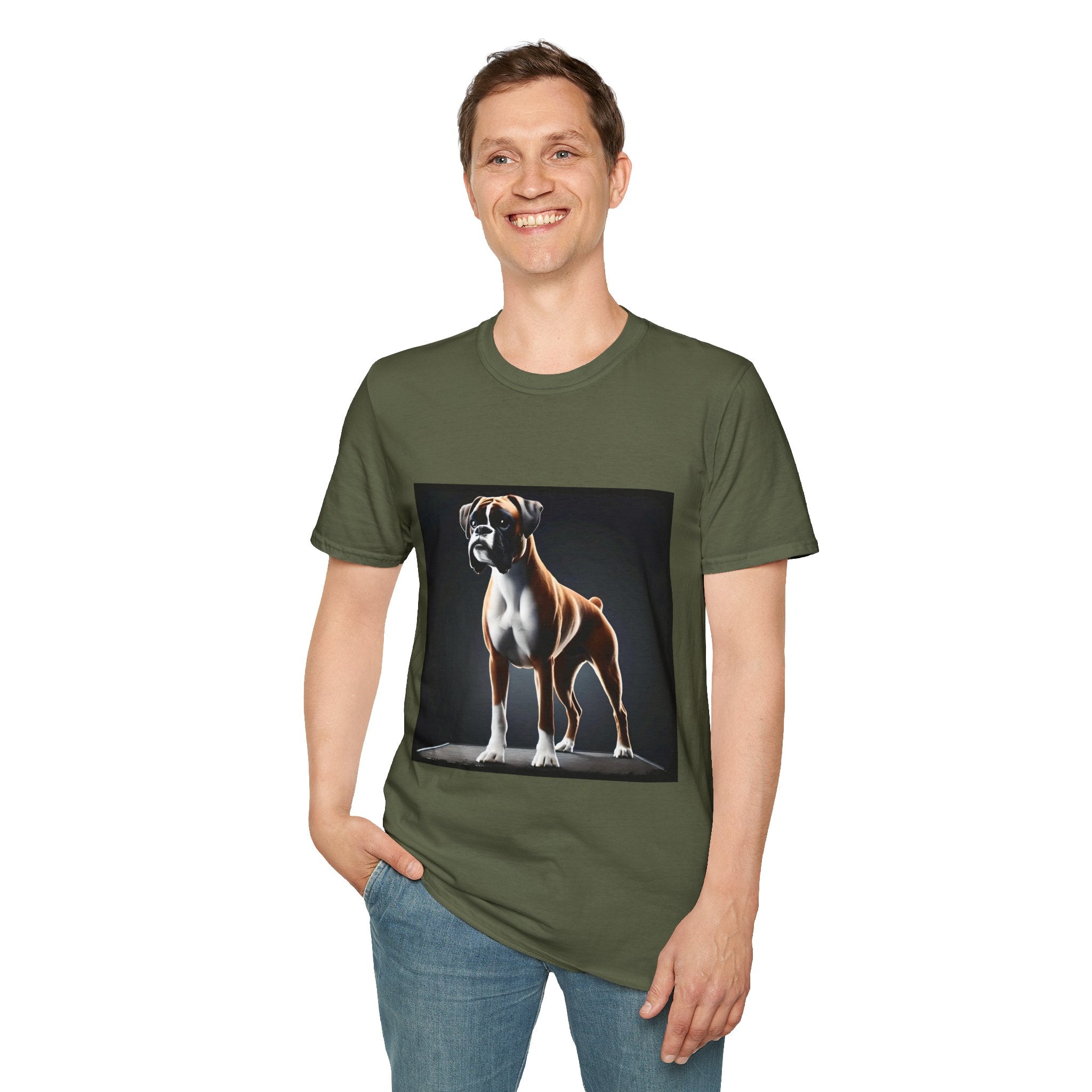 Male model in military green dog t-shirt featuring standing boxer on platform with black background and dramatic lighting.