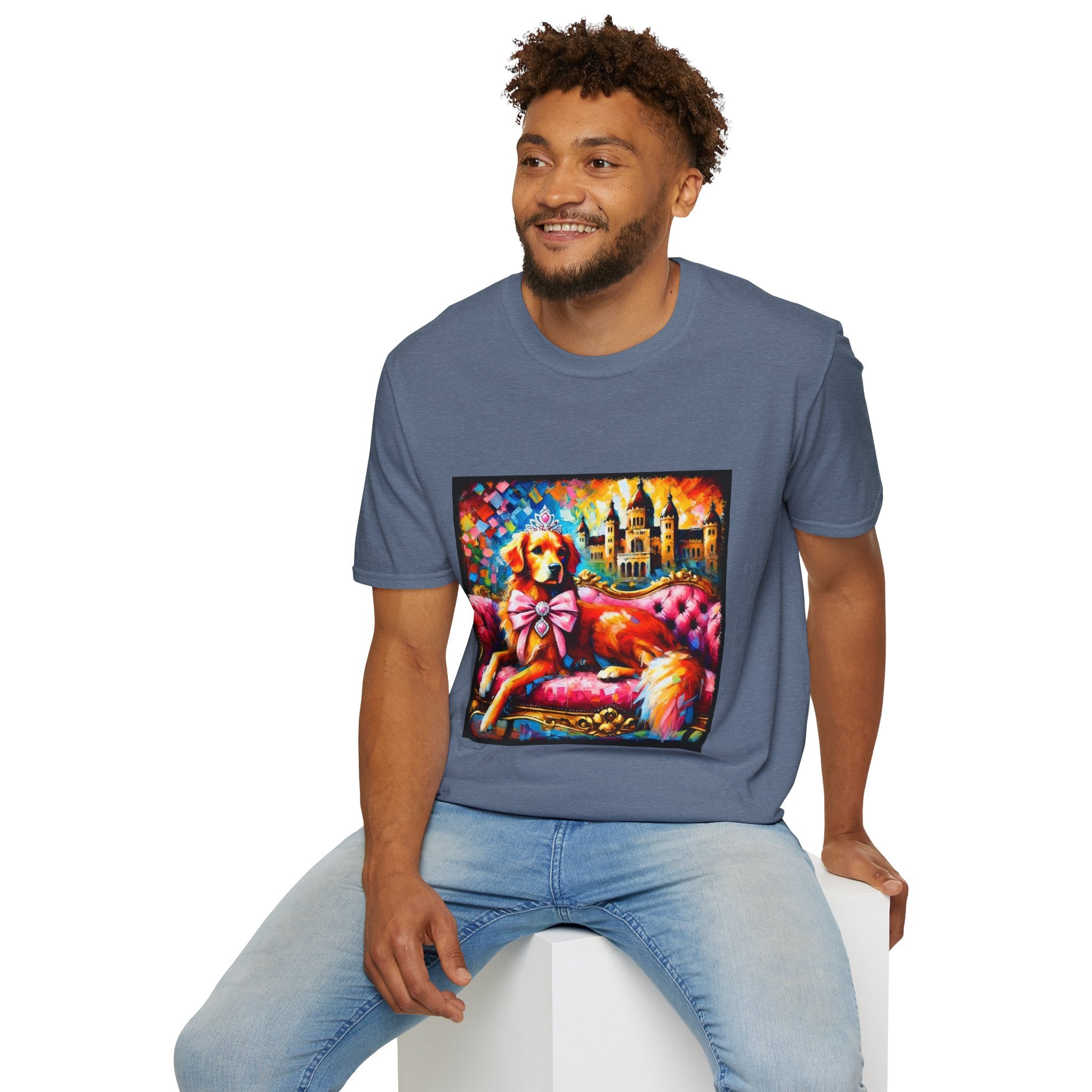 Male model in heather indigo dog t-shirt featuring golden retriever princess on pink settee with tiara and castle backdrop.
