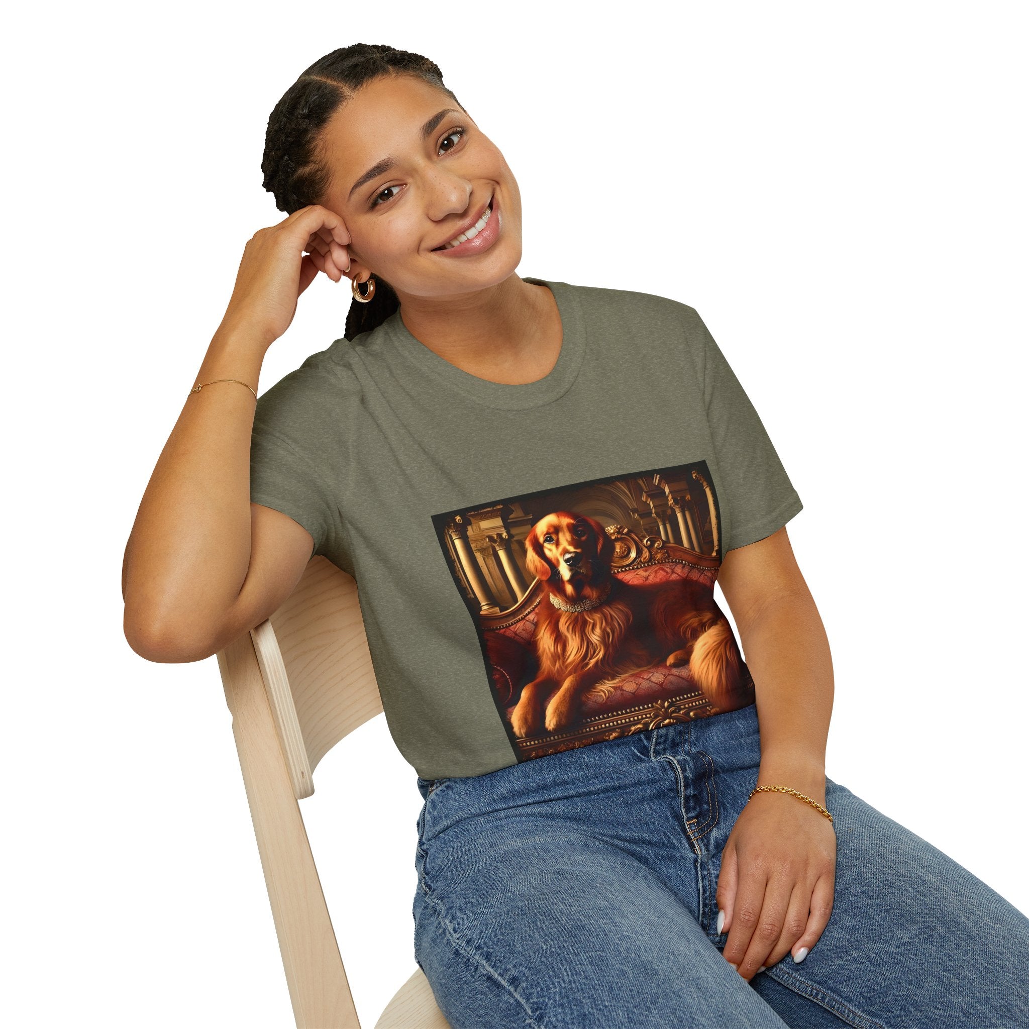 Female model in heather military green dog t-shirt with golden retriever on red settee, pearl collar, and regal columned backdrop.