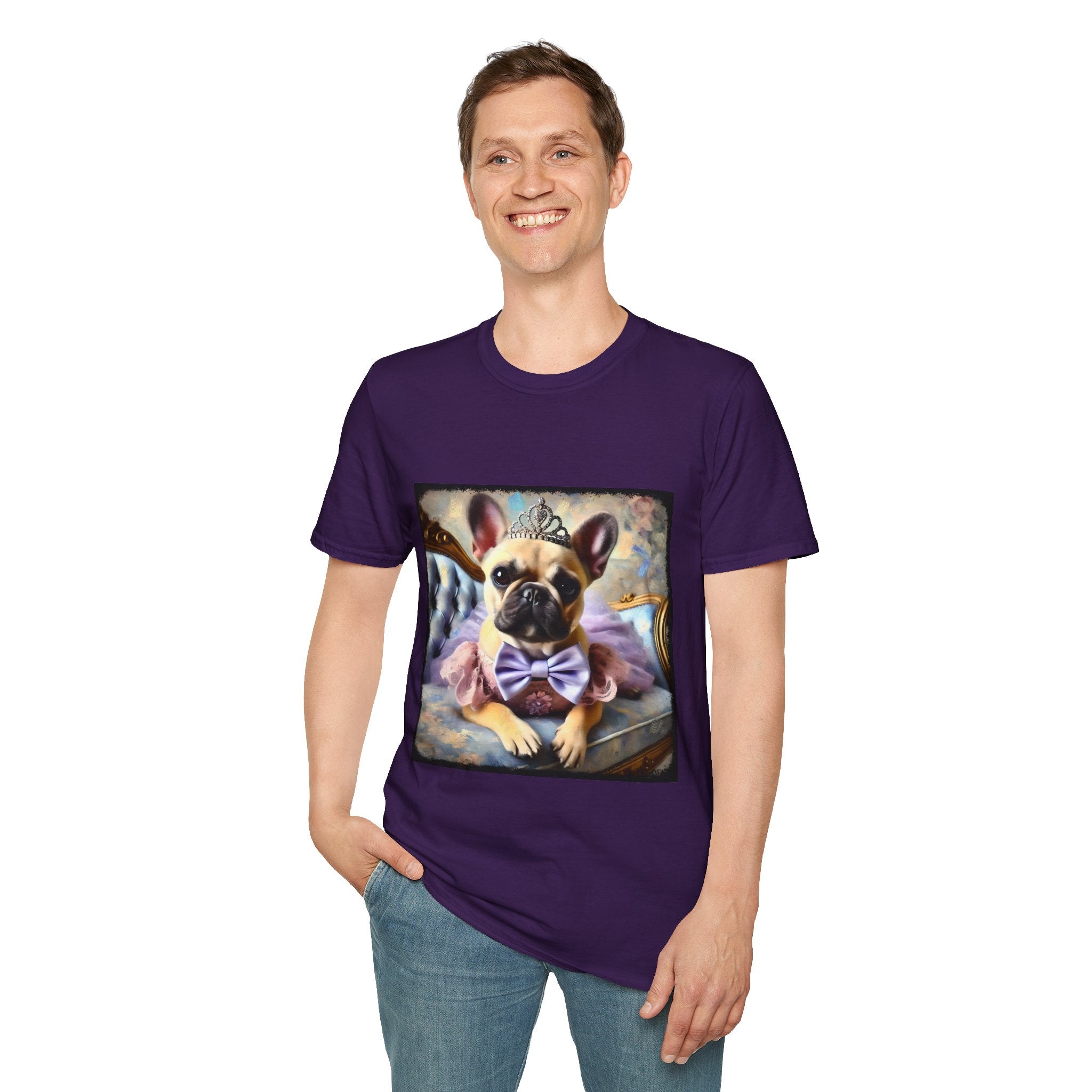 Man smiling in dark purple dog t-shirt featuring French Bulldog in tiara and tutu on royal chair with dreamy pastel background.