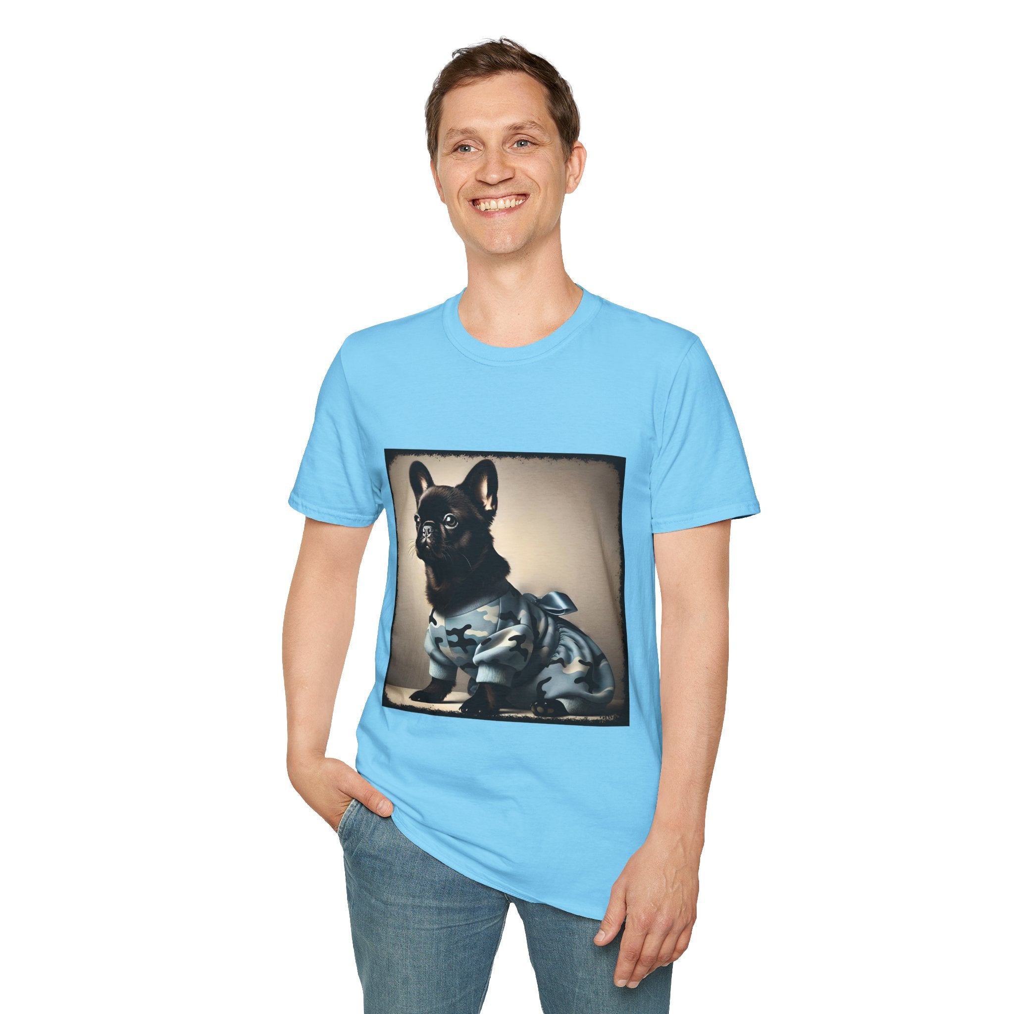 Man smiling wearing sky blue dog t-shirt featuring black French Bulldog in blue camo outfit with bow, set in soft vintage portrait.