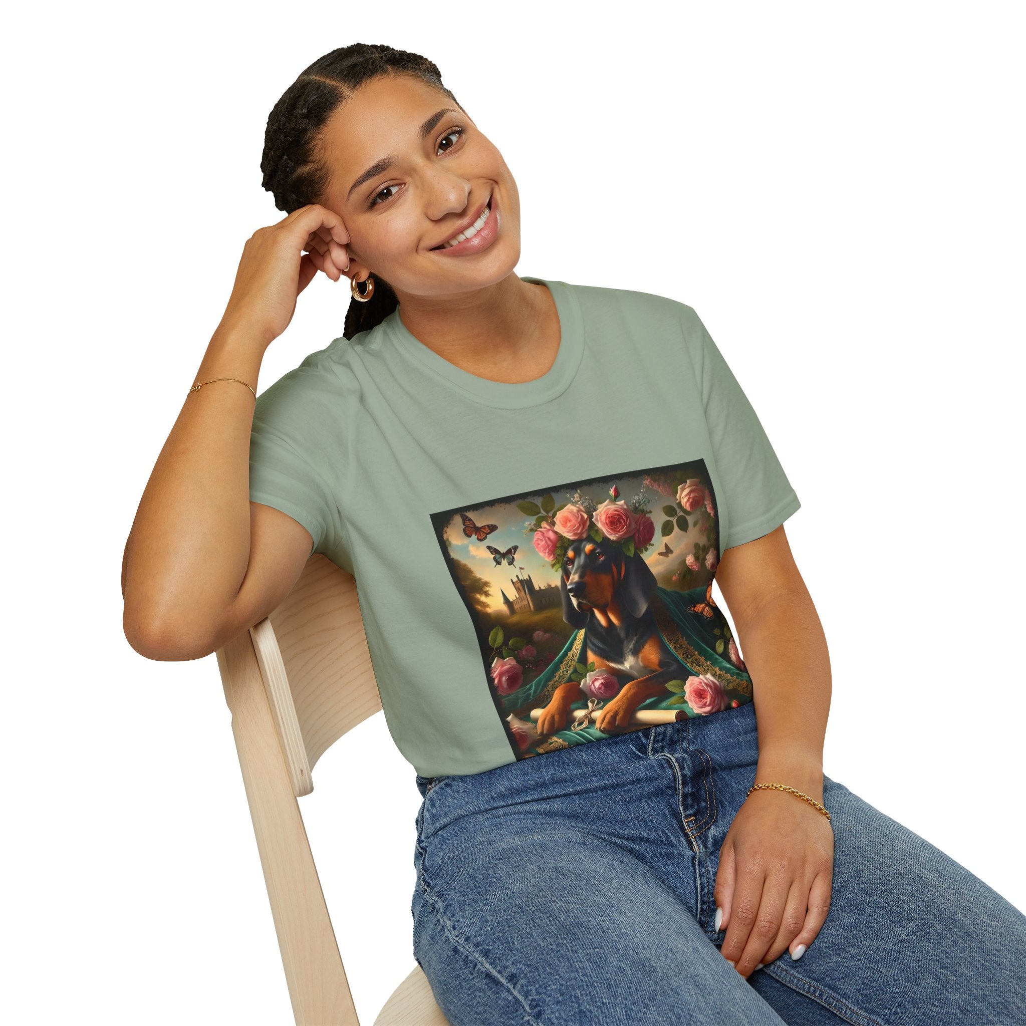 Female model in sage green dog t-shirt featuring coonhound in rose garden wearing green embroidered cape and crown of pink flowers.