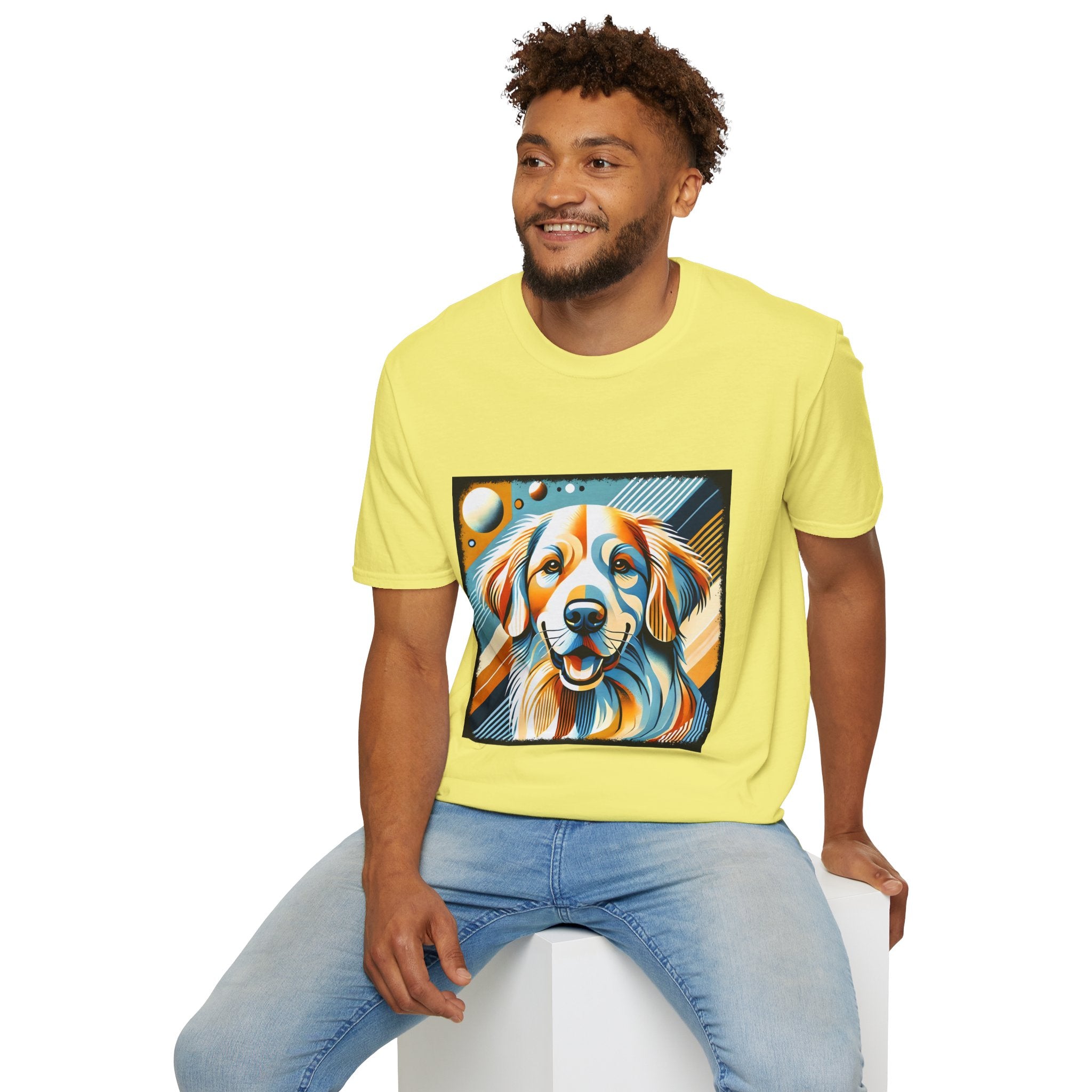 Male model in yellow dog t-shirt featuring smiling golden retriever in abstract pop style with blue, orange, and cream tones.