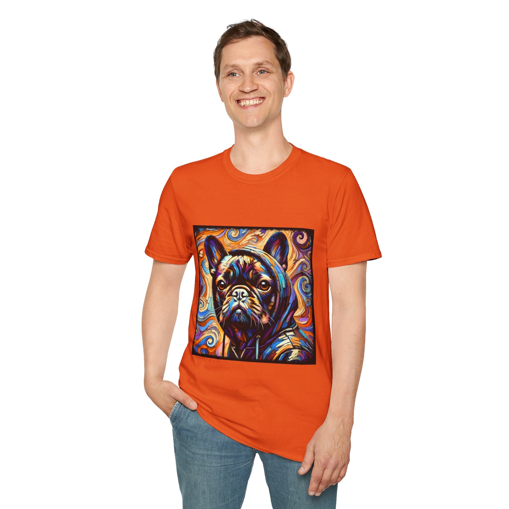 Man smiling in bright orange dog t-shirt featuring colorful French Bulldog in hoodie with vivid swirl background.