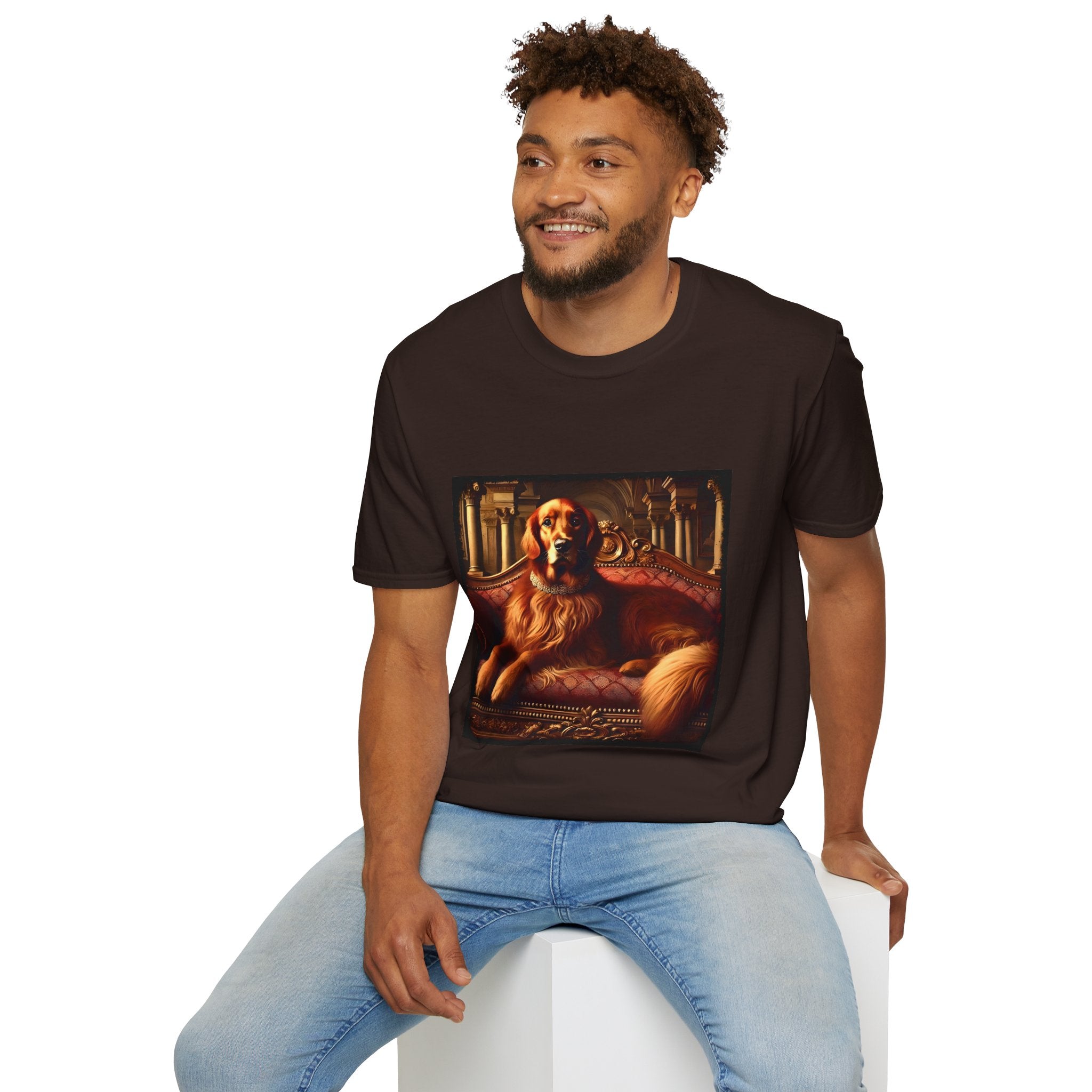 Male model in dark chocolate dog t-shirt with golden retriever on red settee, pearl collar, and regal columned backdrop.