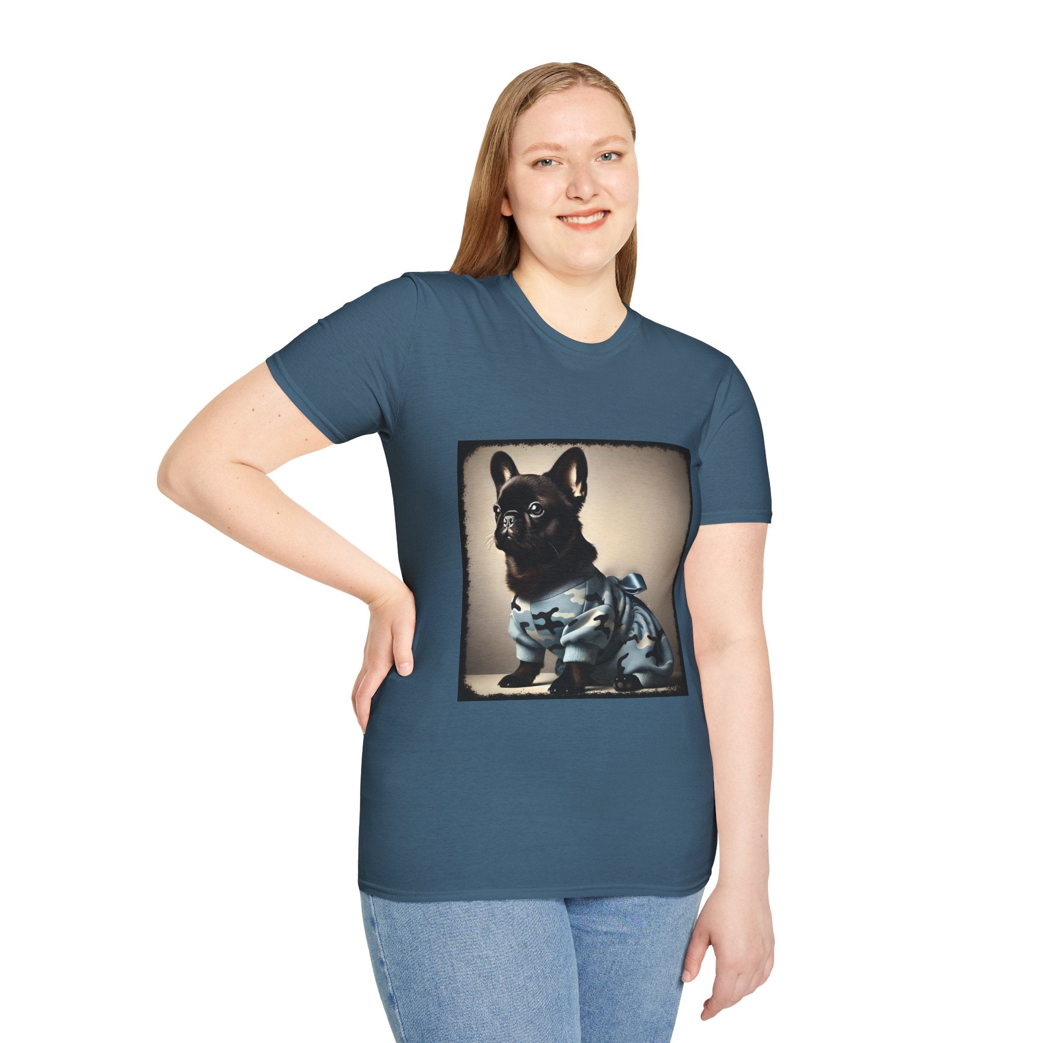 Female model wearing indigo blue dog t-shirt featuring black French Bulldog in blue camo outfit with bow, set in soft vintage portrait.