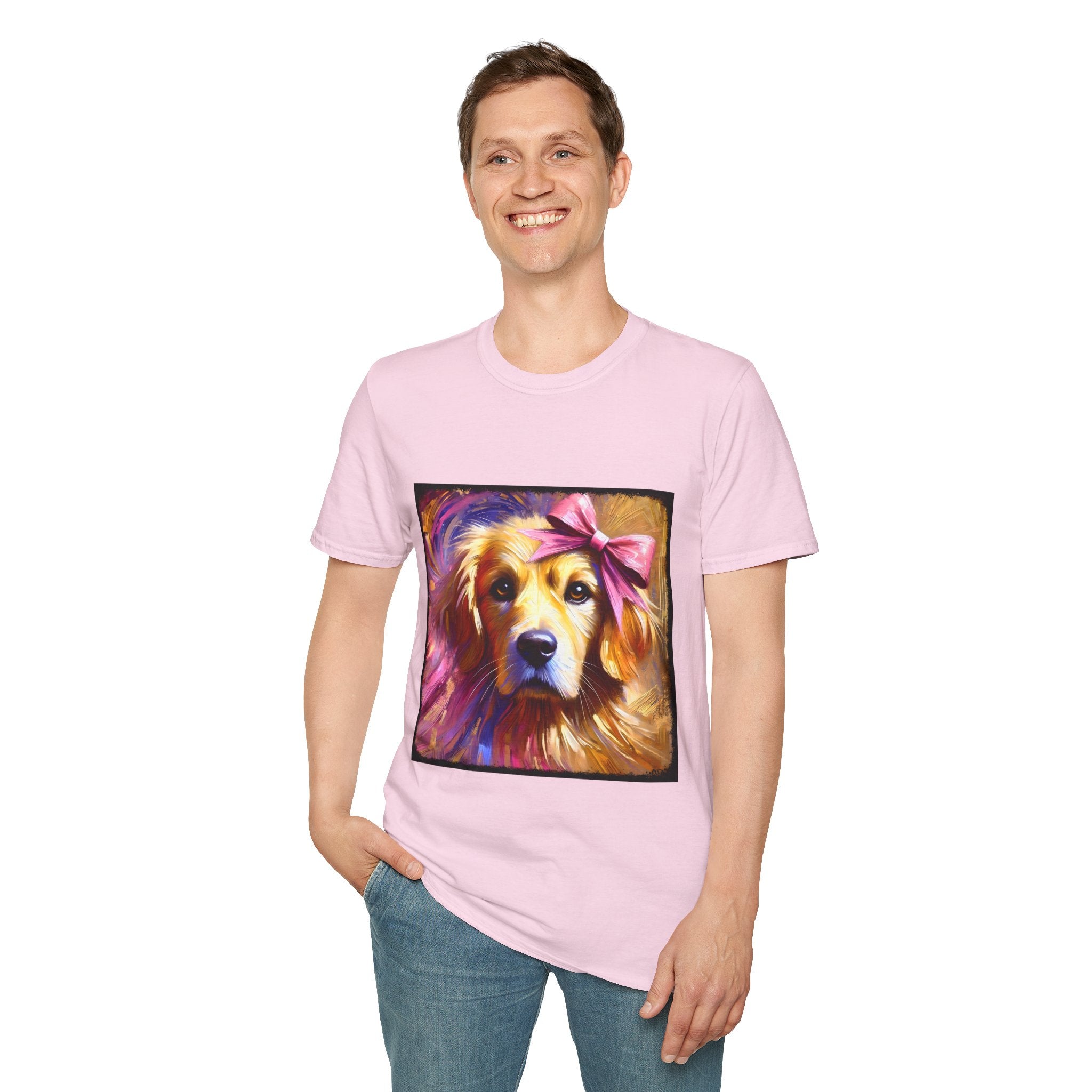 Male model in light pink dog t-shirt featuring golden retriever with pink bow on head, bold brushstroke background in pinks.
