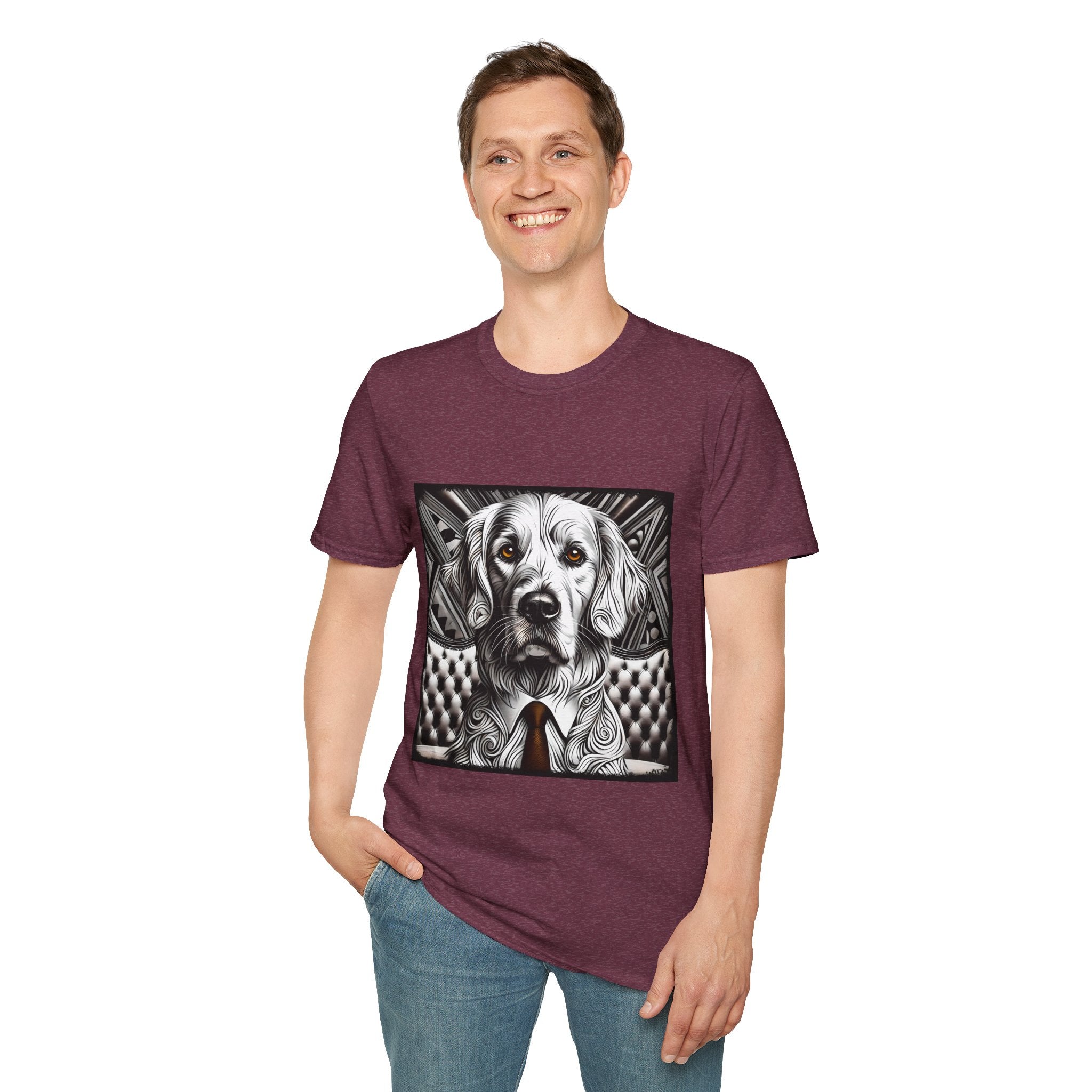 Male model in heather maroon dog t-shirt featuring monochrome golden retriever with brown eyes and tie in front of settee.
