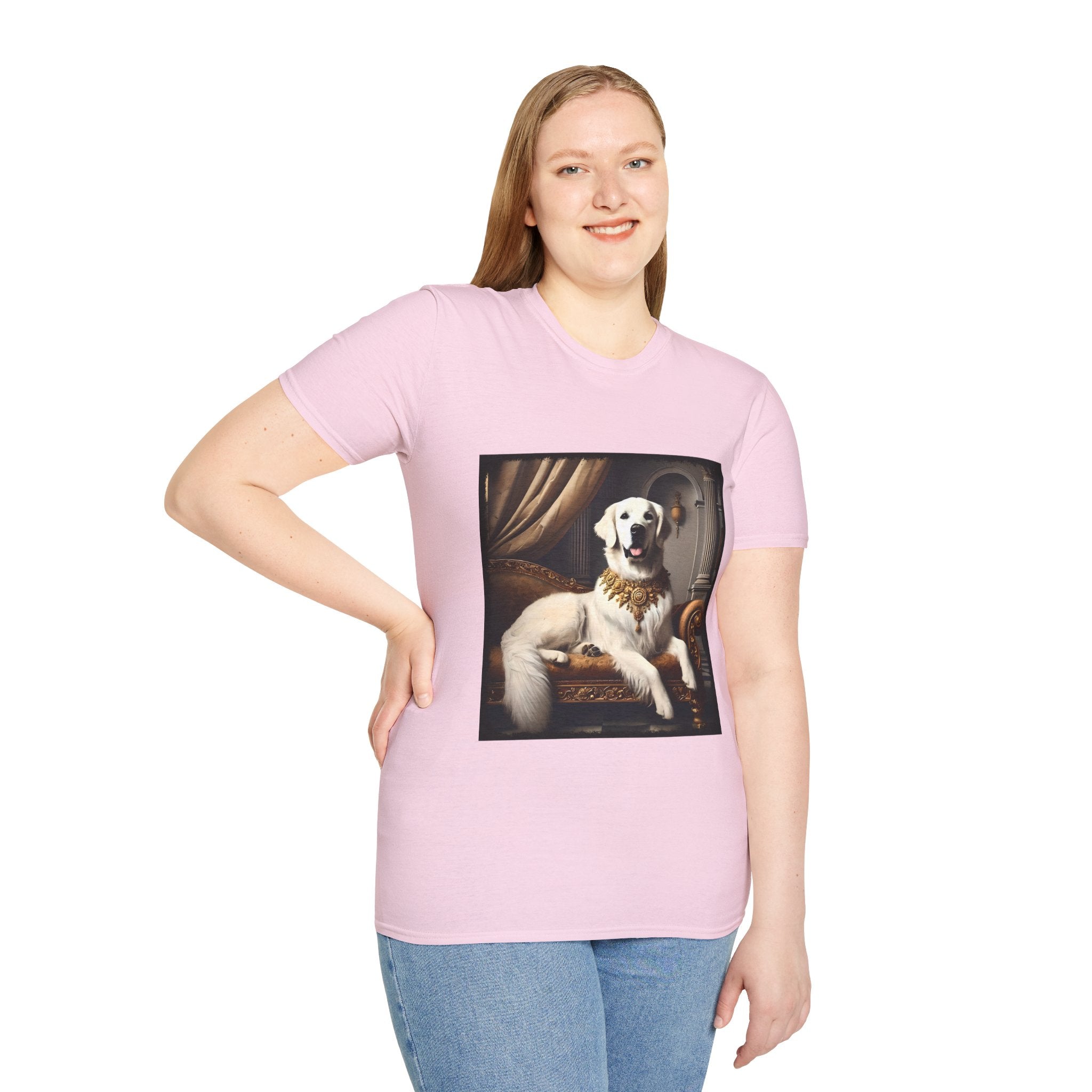 Female model wears light pink dog t-shirt featuring a regal white golden retriever lounging on a gold settee with ornate curtains.