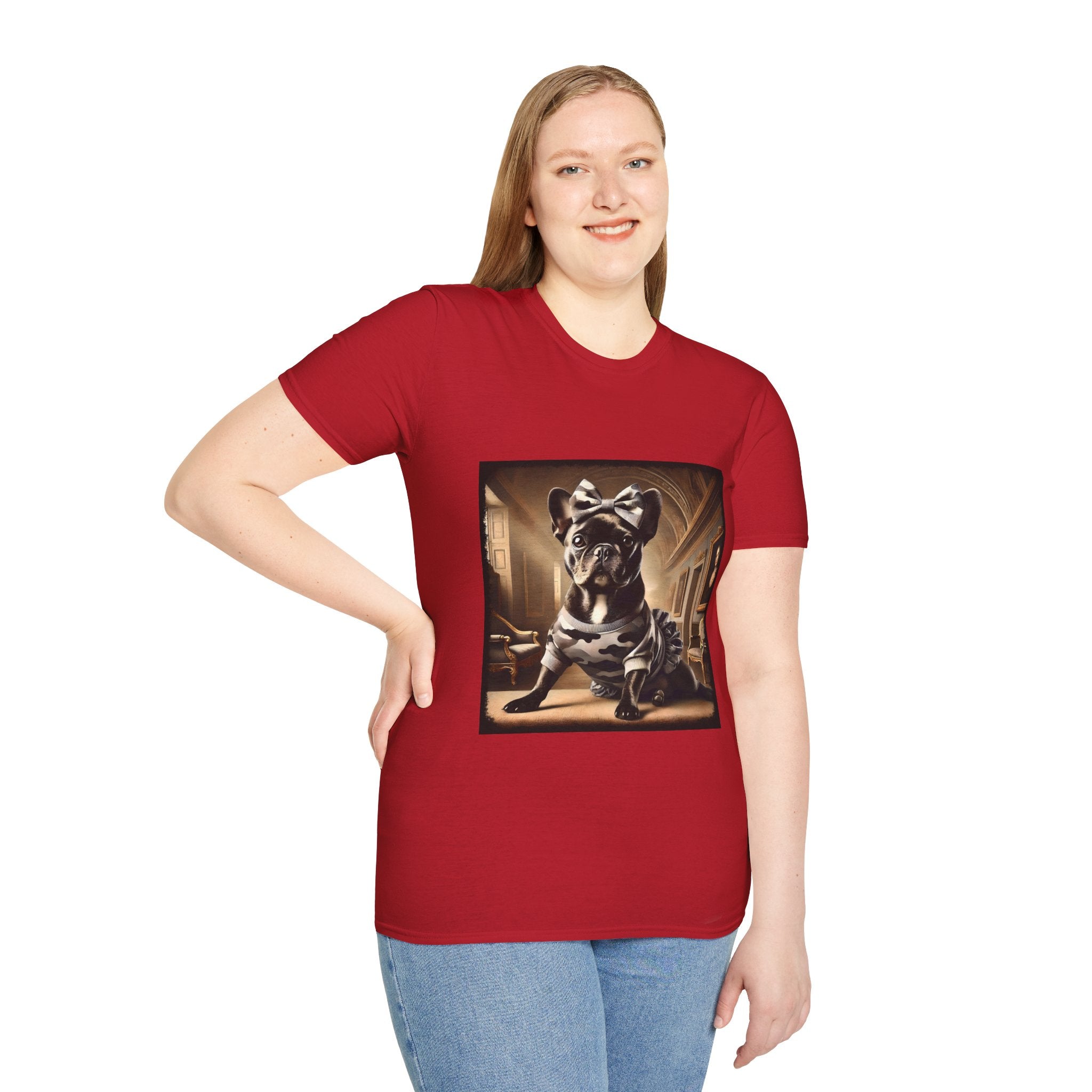 Female model in cherry red dog t-shirt featuring black French Bulldog in camo dress and bow, set in sepia-toned palace hall.