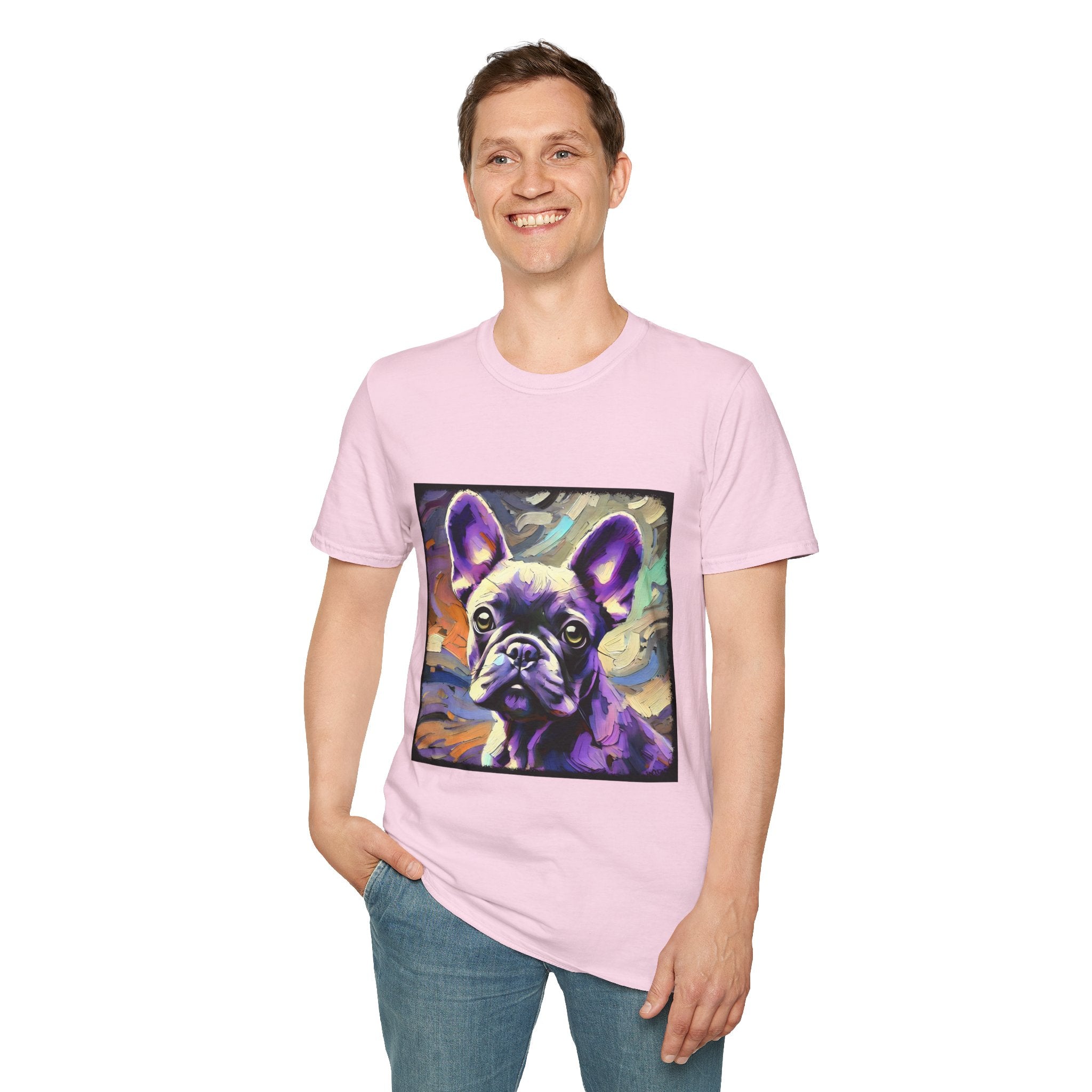 Man smiling in light pink dog t-shirt featuring a lavender purple French Bulldog with swirling brushstrokes of teal, orange, and cream.