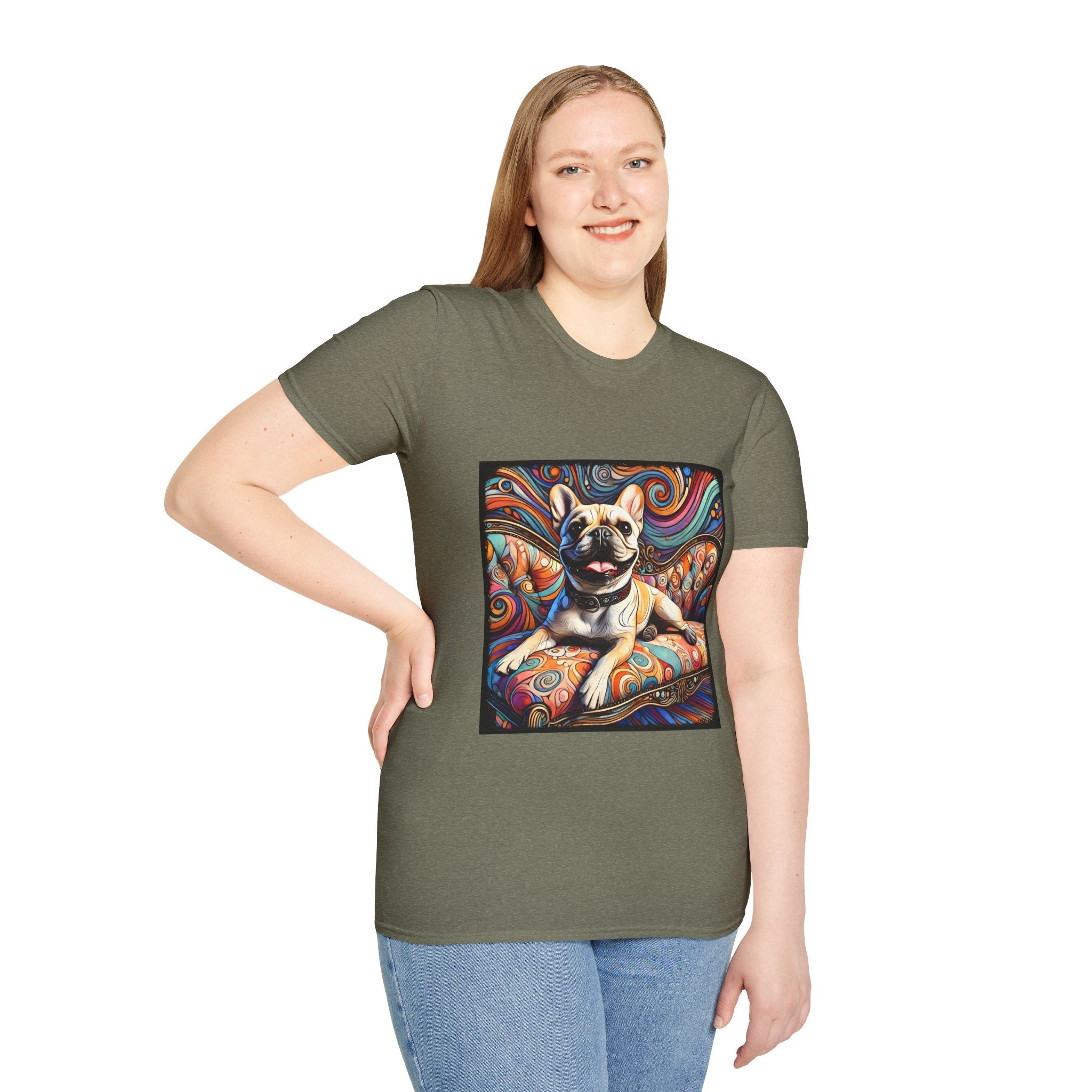 Female model in heather military green dog t-shirt featuring fawn French Bulldog lounging on swirl settee with vivid colorful background.