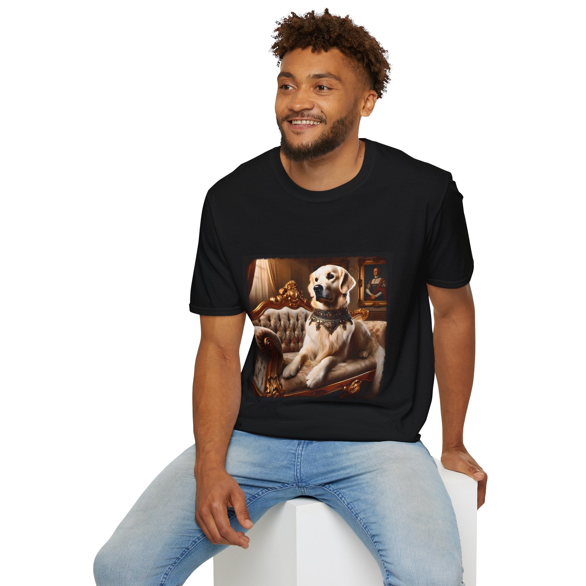 Male model in black dog t-shirt featuring golden retriever in jeweled collar on ornate cream and gold settee, regal setting.