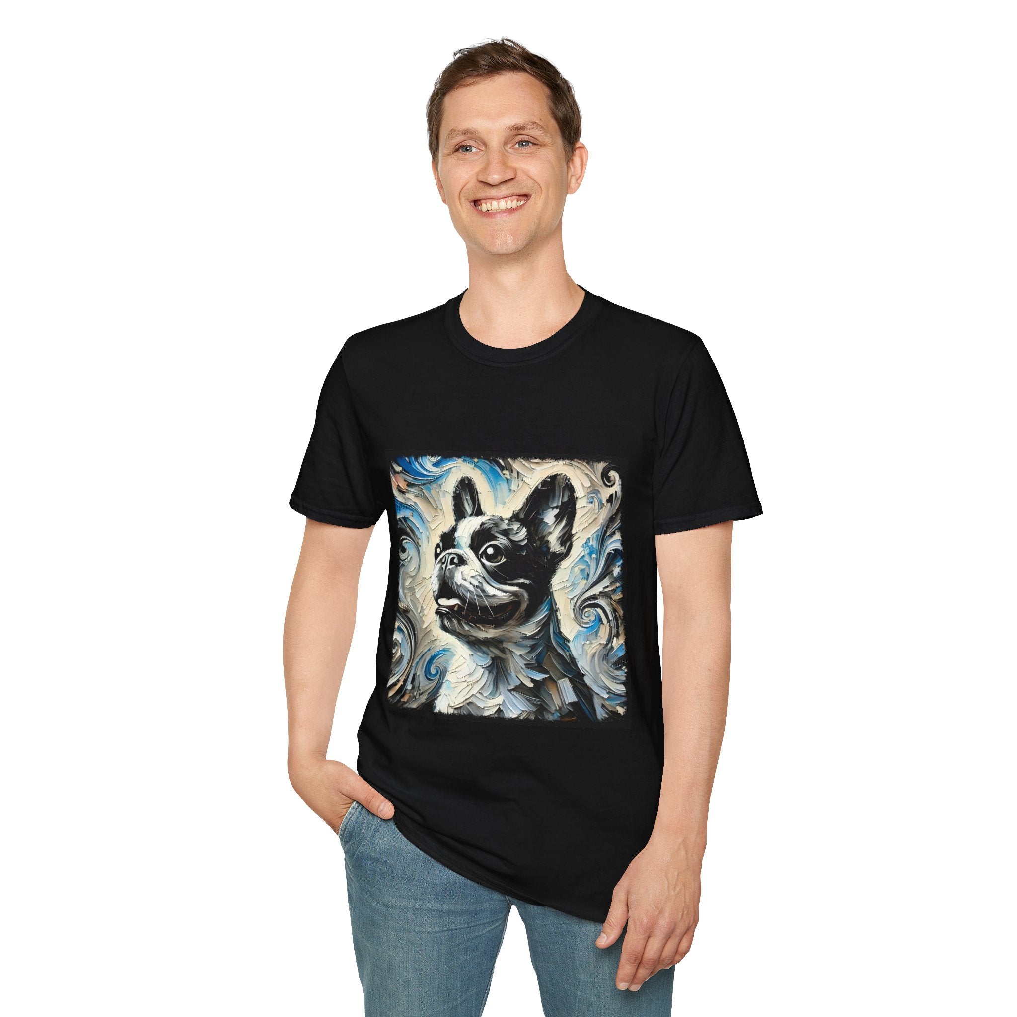 Man smiling in black dog t-shirt with black and white French Bulldog portrait on swirl-patterned vintage background.